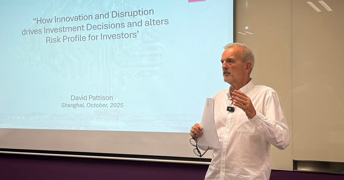 Man in a white shirt giving a presentation titled 'How Innovation and Disruption drives Investment Decisions and alters Risk Profile for Investors' by David Pattison in Shanghai, October 2025.