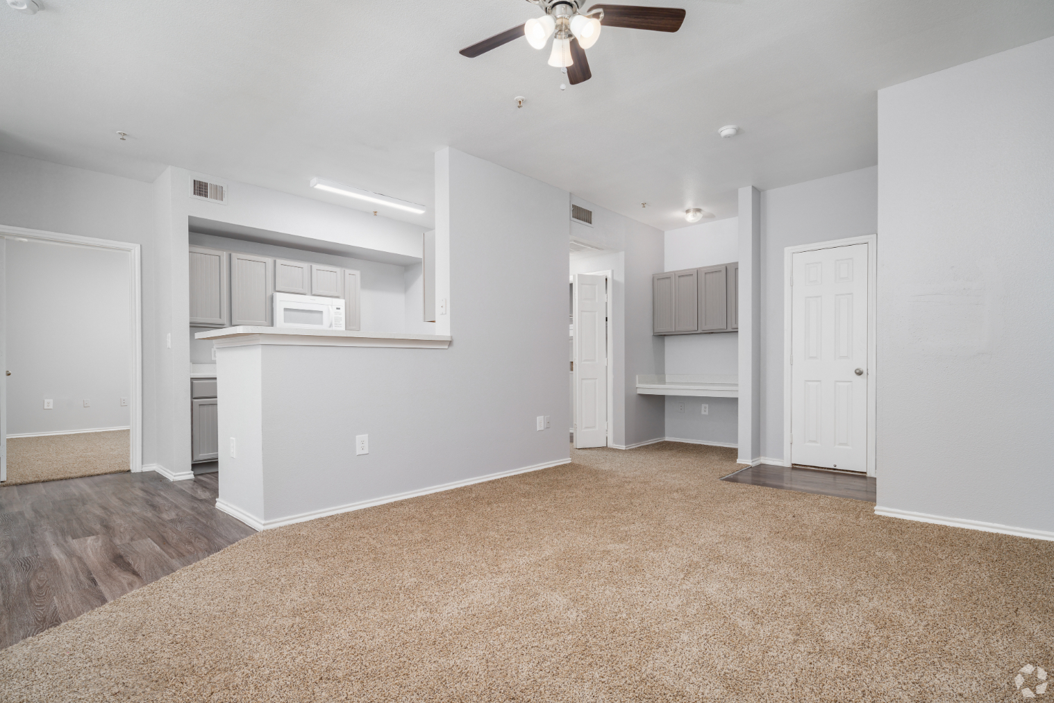 living and dining area with view of kitchen