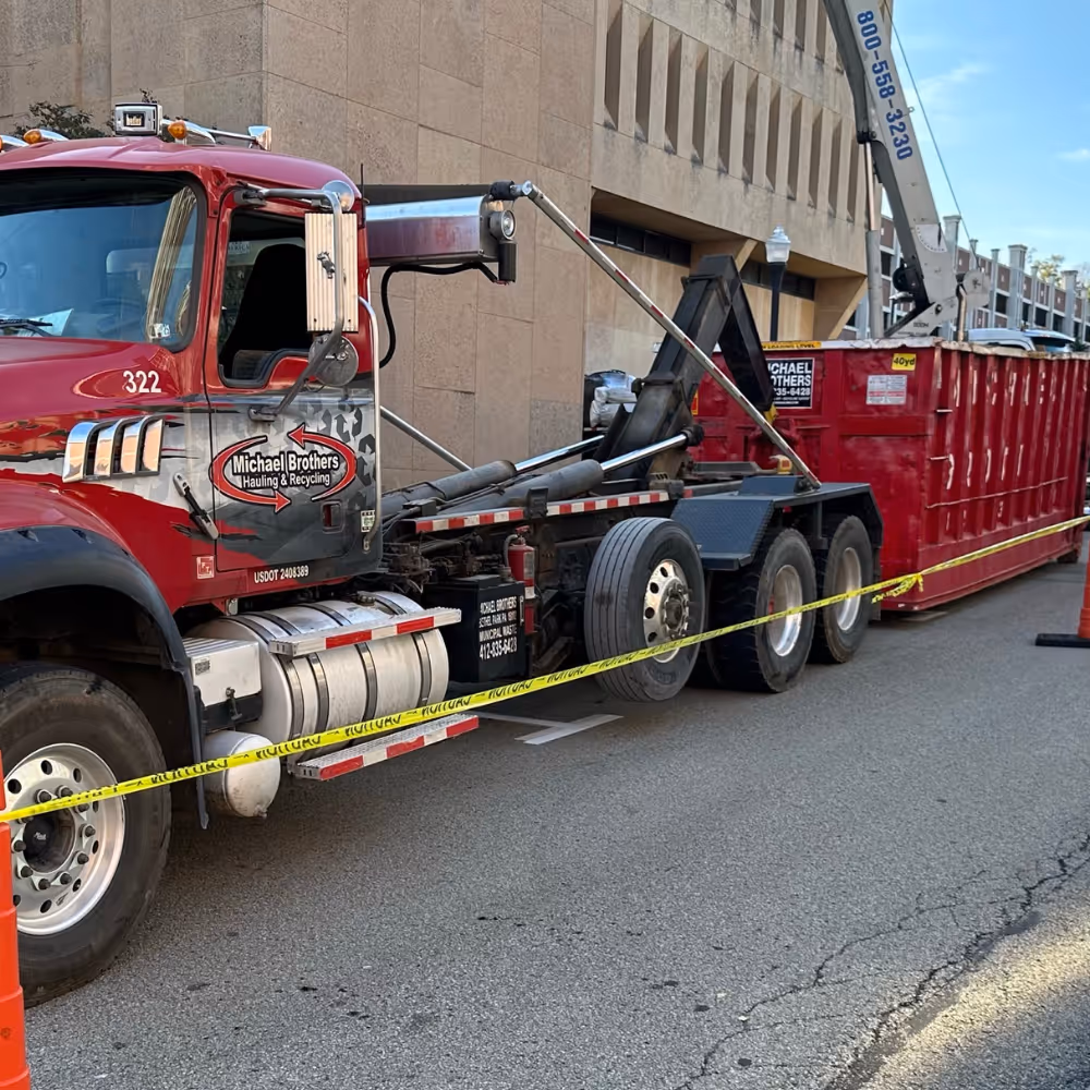 About Us Truck with Roll Off