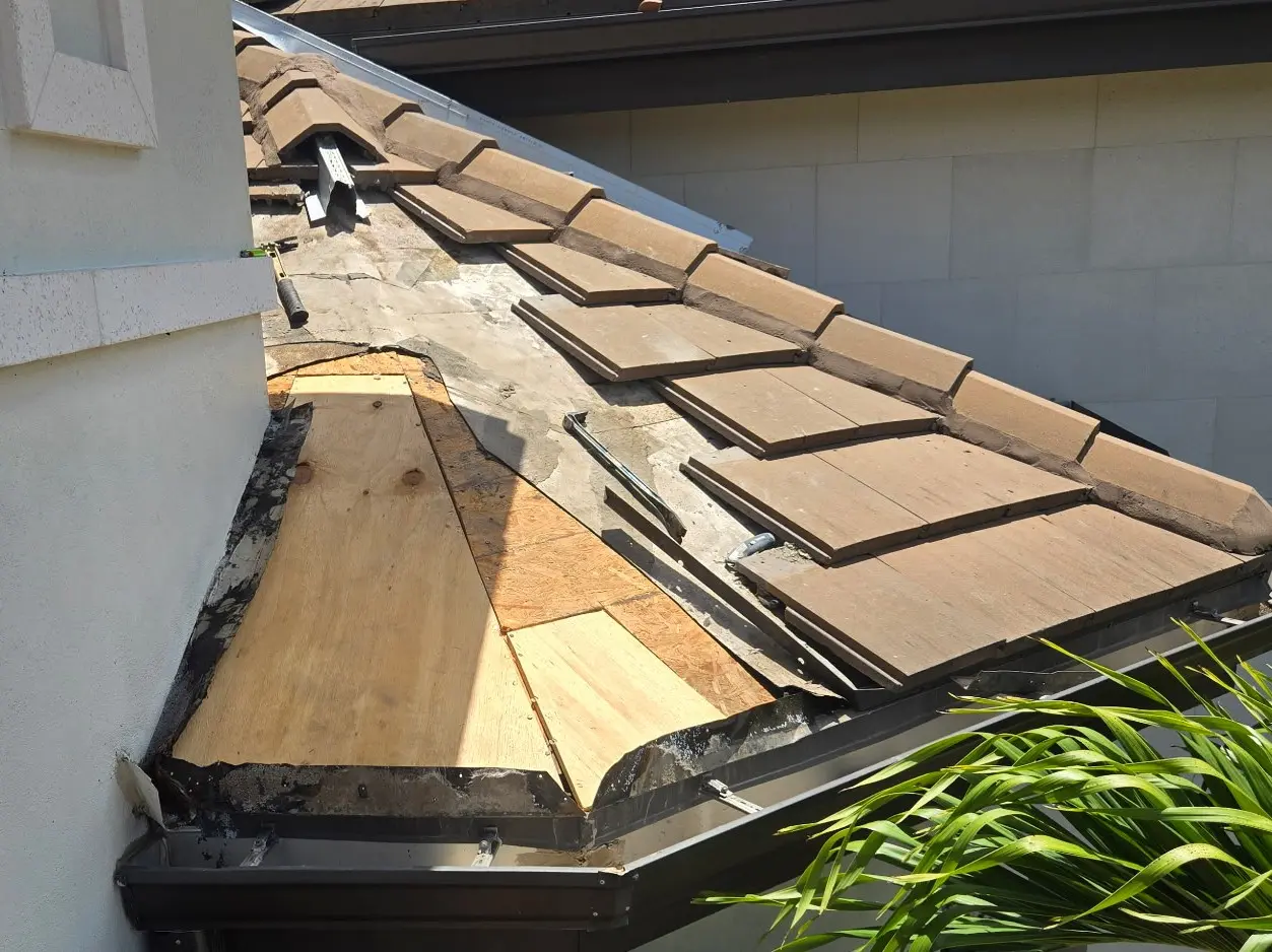 Tile roof repair in Naples FL showing repair work in progress by Rectangle Roofing