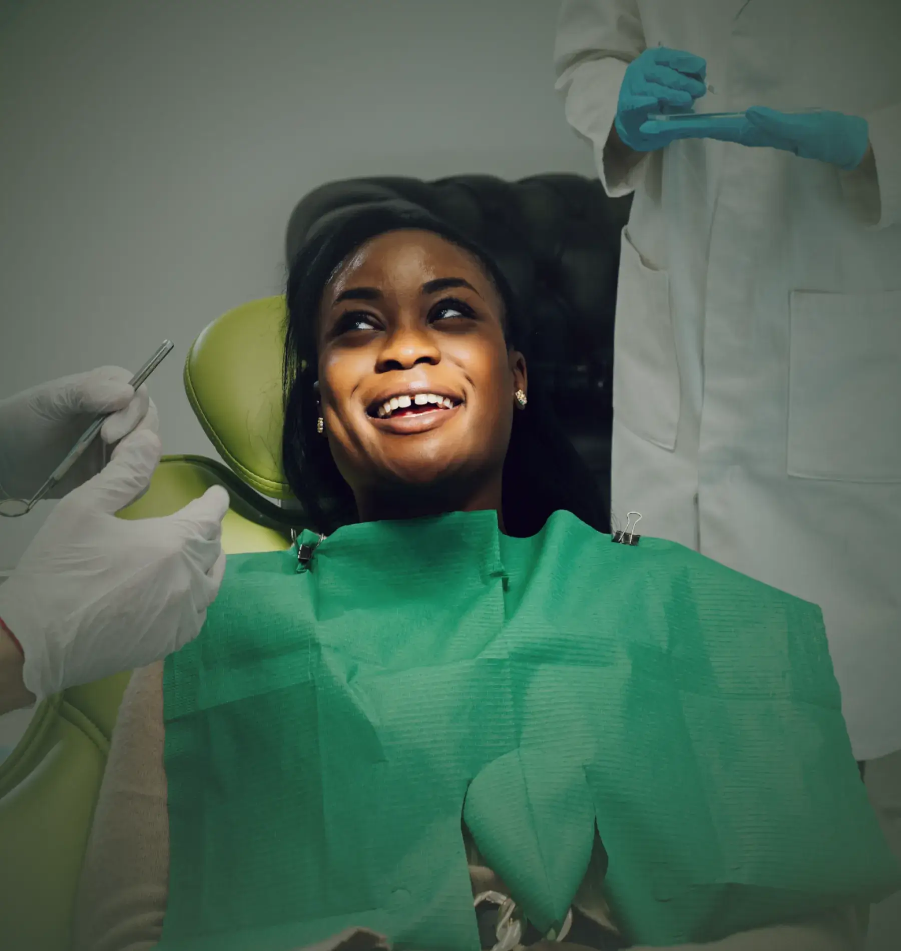 Woman sitting on the dentist chair