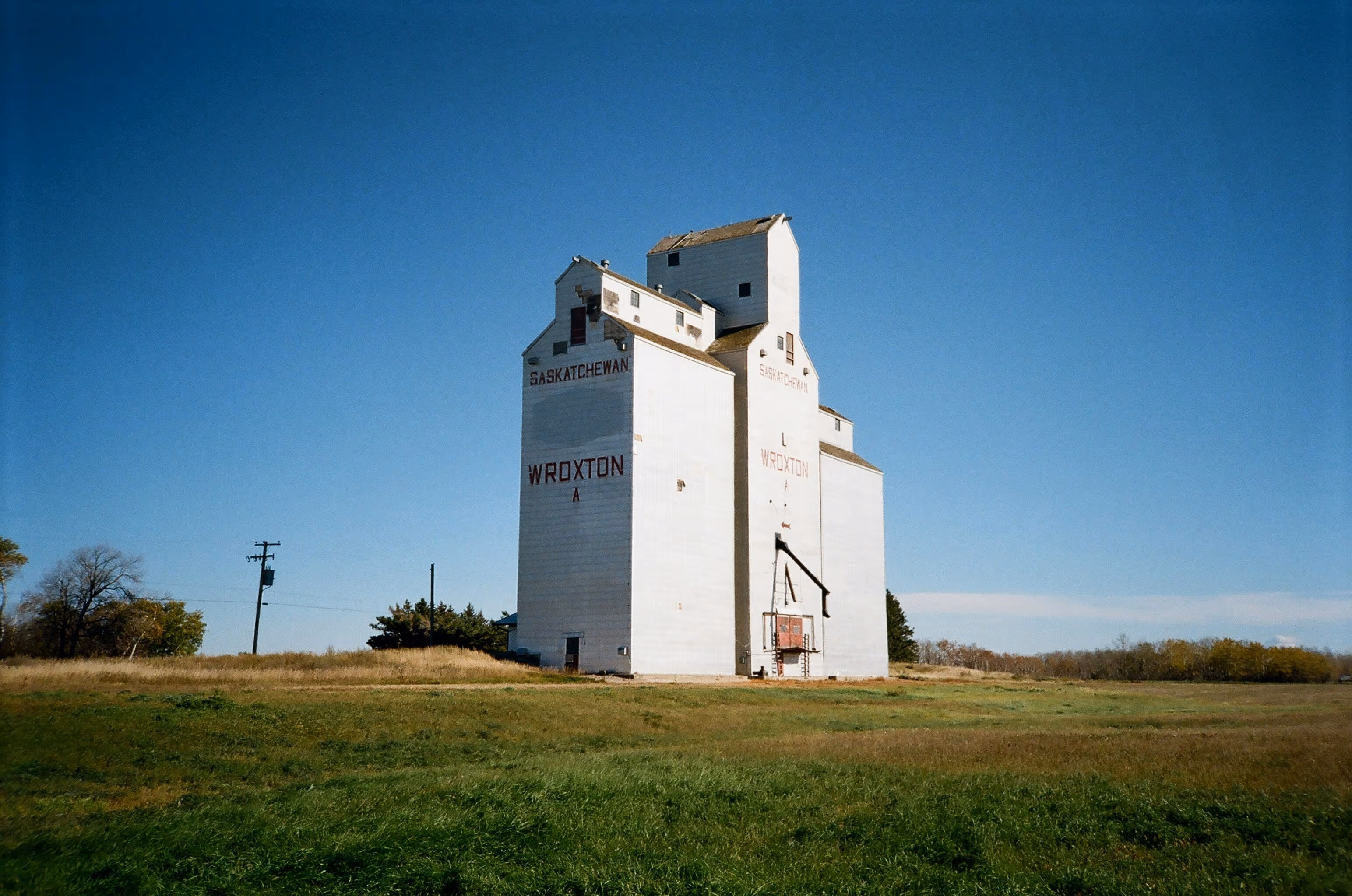Prairie Grain Elevators & Canola Fields (Saskatchewan). Reliable at scale.