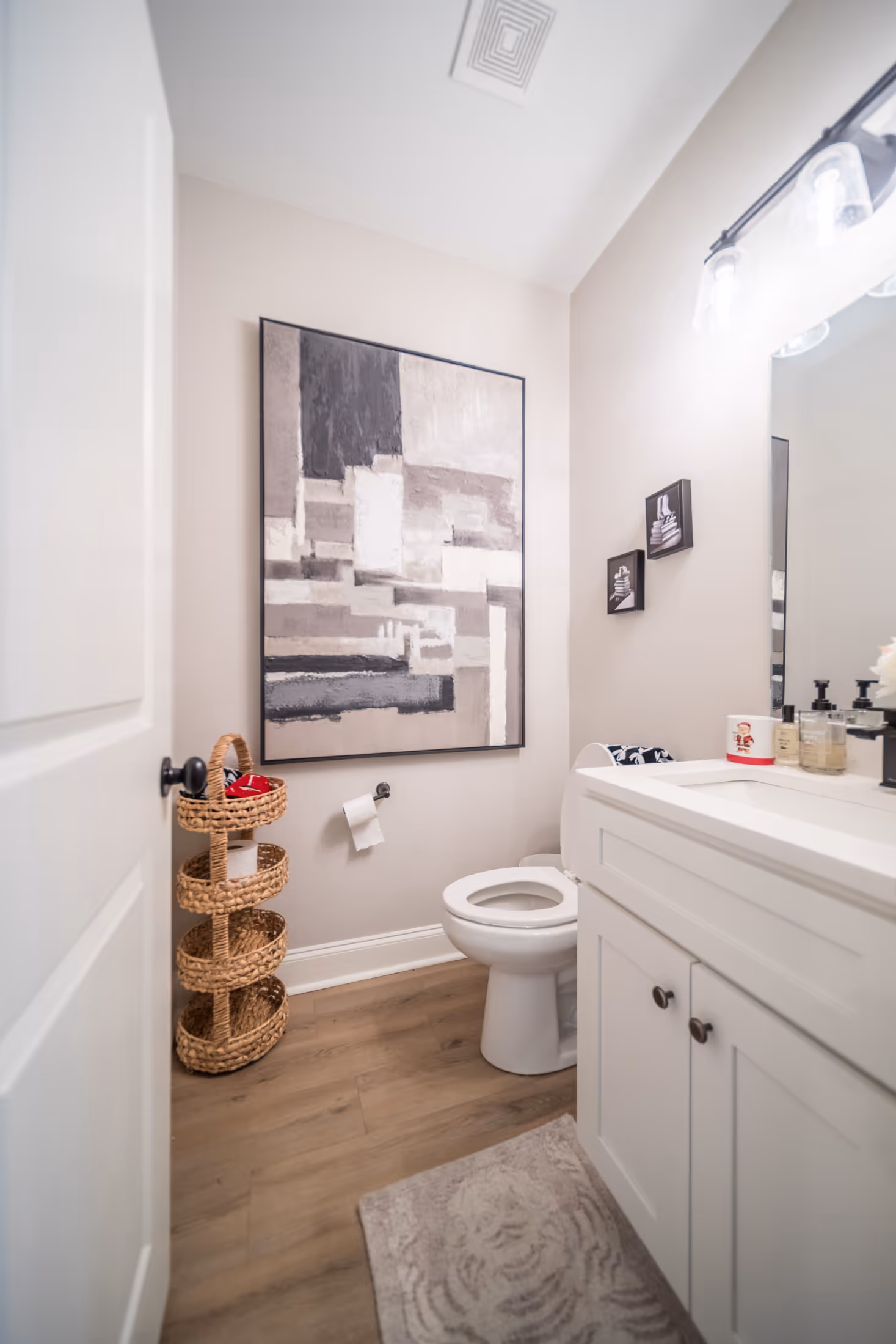 bathroom with wall art