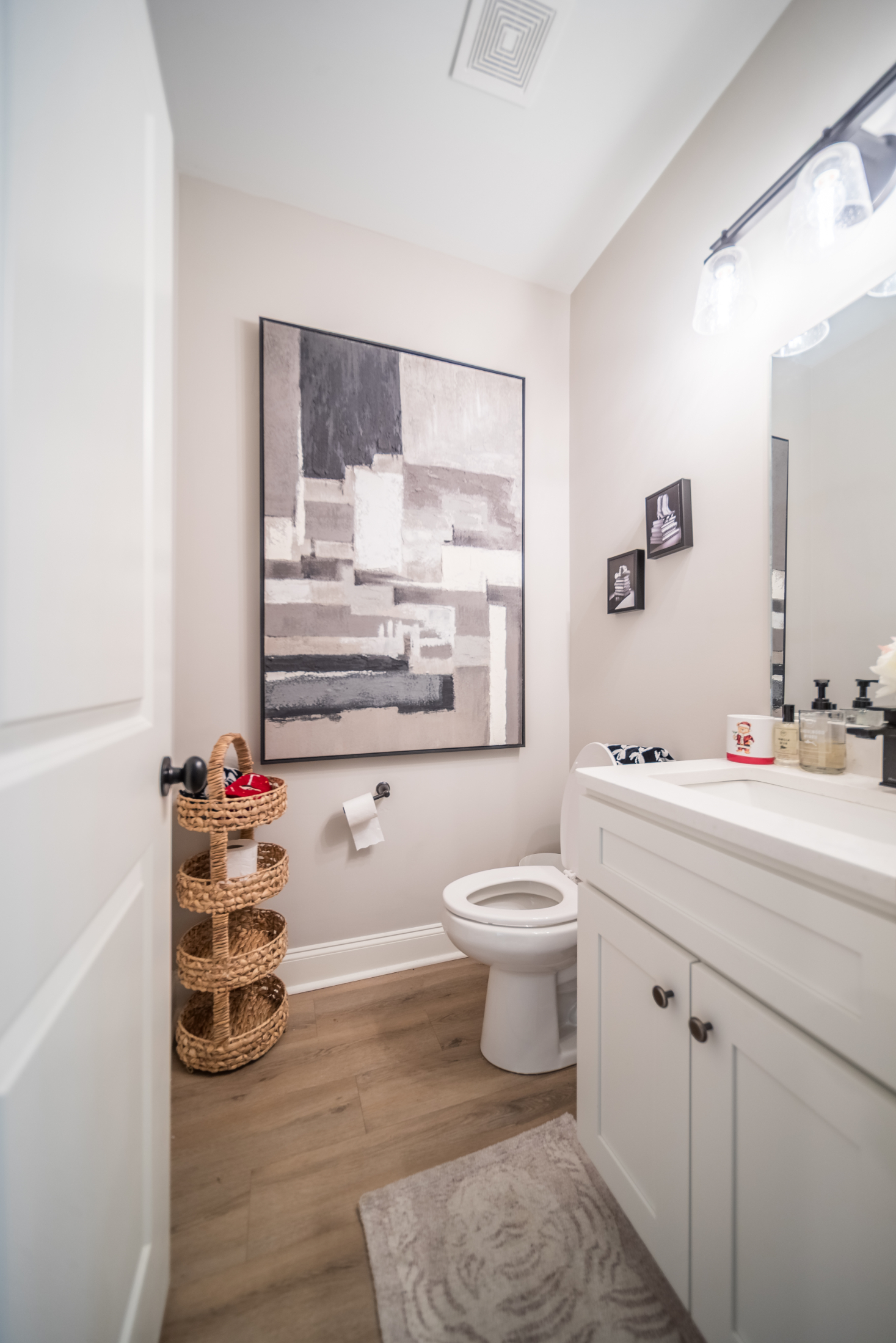 bathroom with wall art