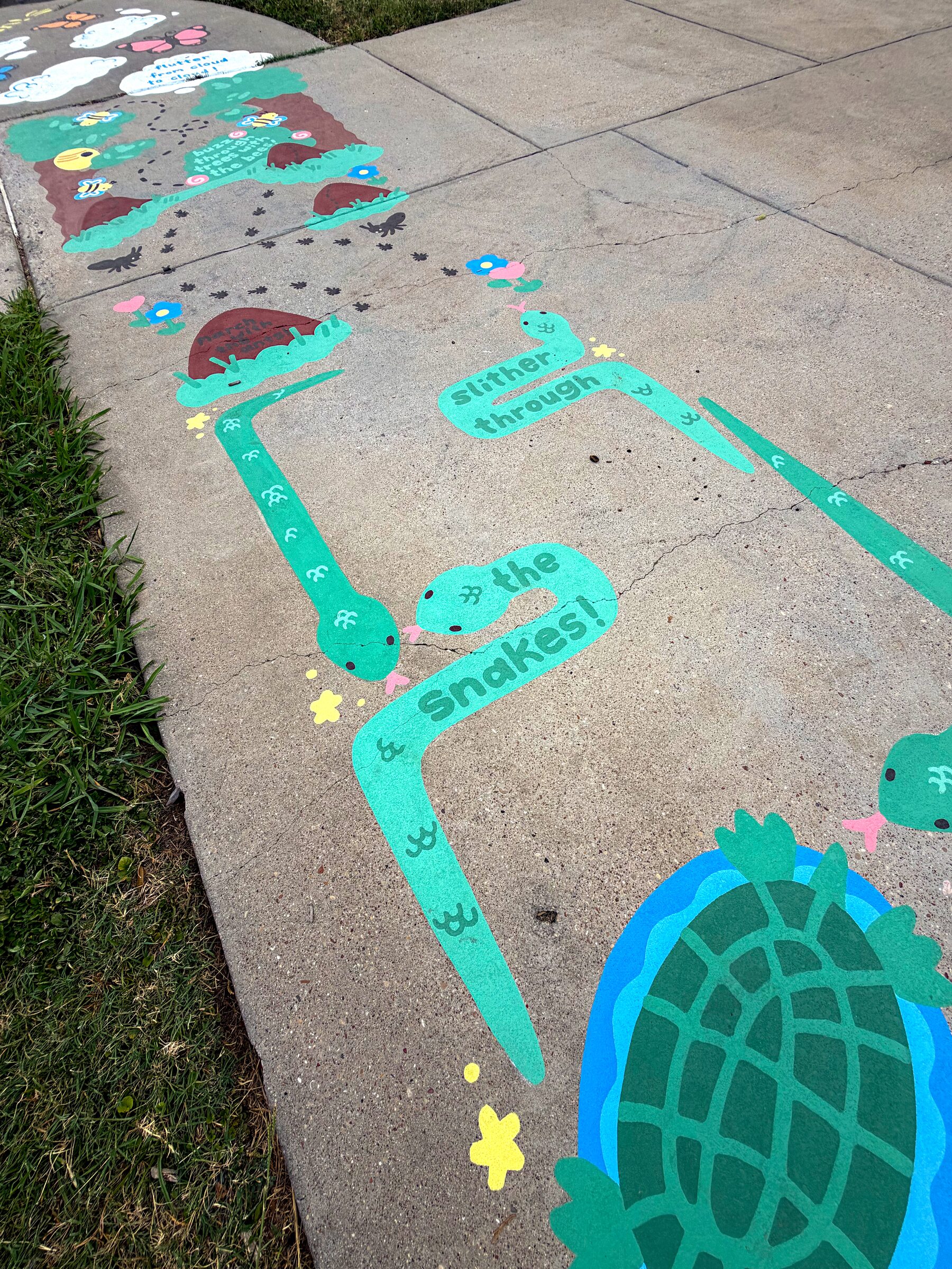 Aerial view of a Brazos and beavers themed sidewalk obstacle course at Dewey Community Center.
