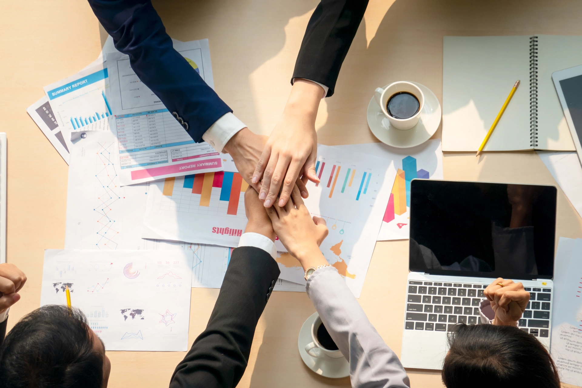 Team collaborating on AI marketing plan integrating SEO best practices, ad targeting, and lead generation for small businesses.