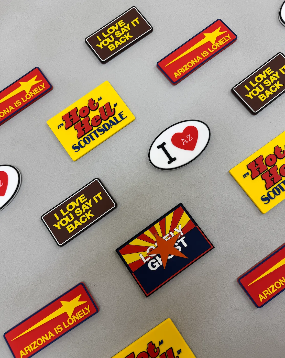 Rubber magnets in yellow, blue, and grey made for lonely ghost