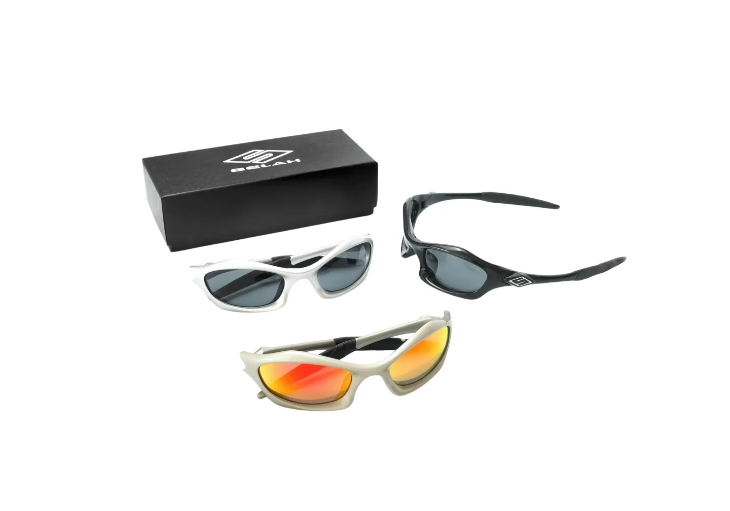 A pair of 3 custom sunglasses with metal implants and custom box