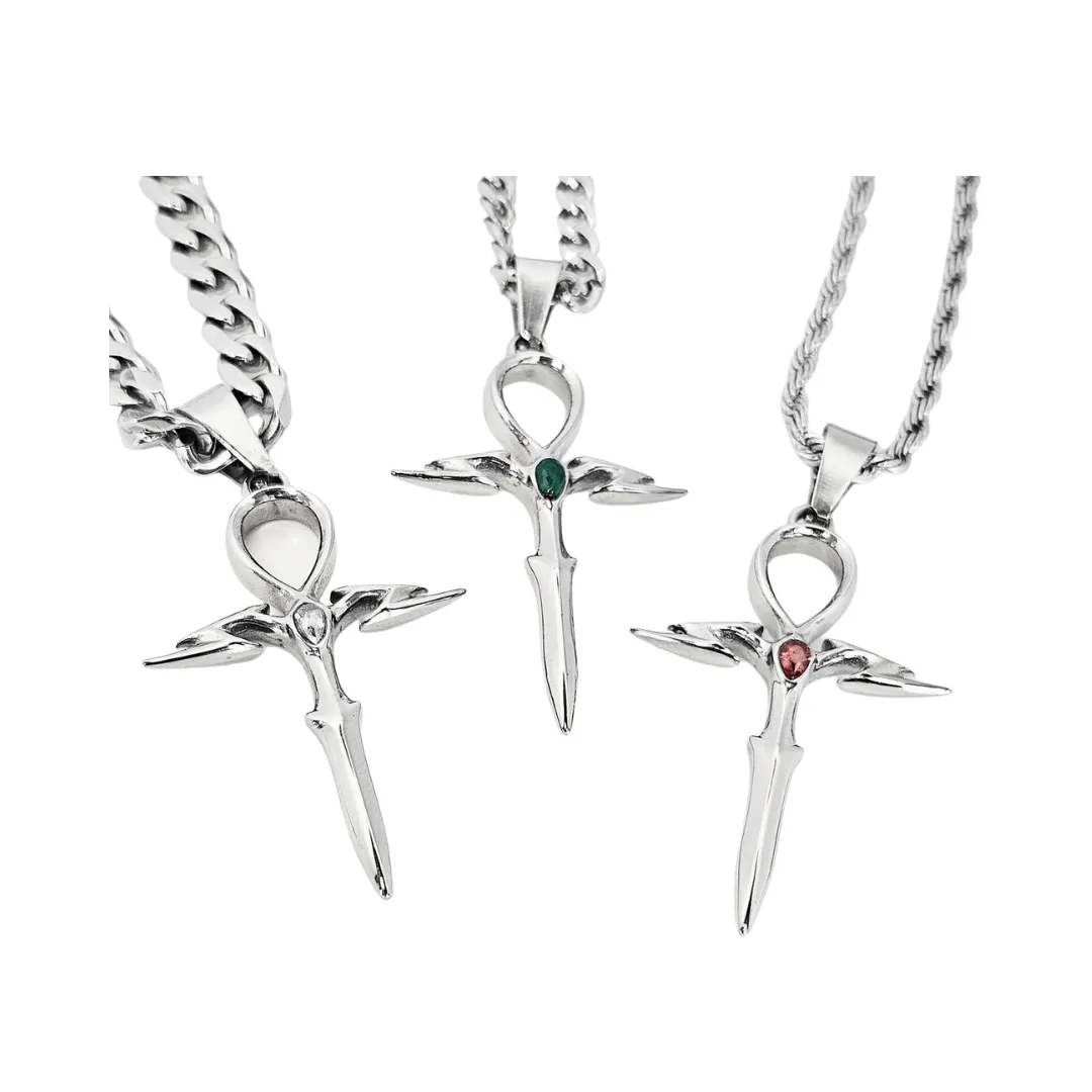 A custom necklace set with clear, green, and red gems