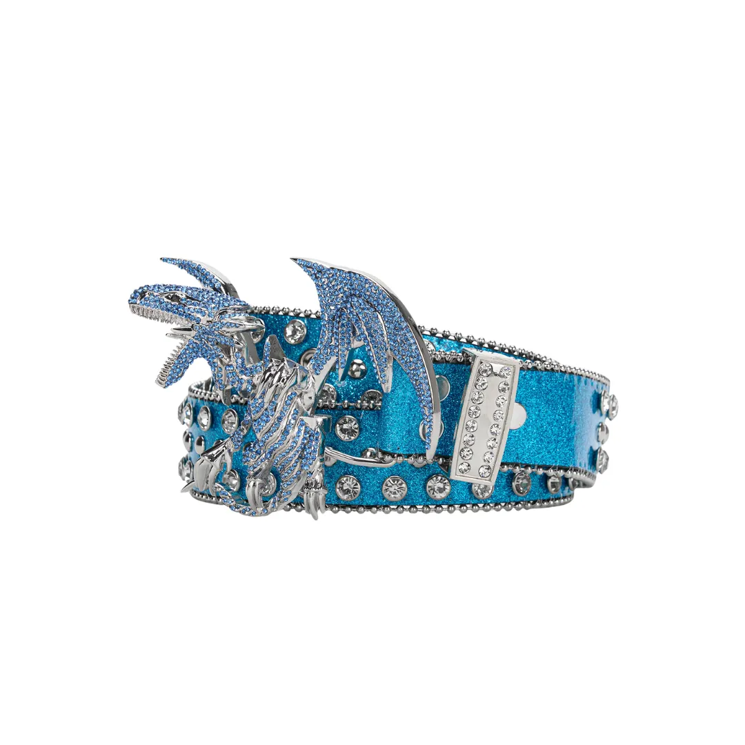 A blue eyed dragon belt buckle with matching blue belt embellished with glitter and gems 