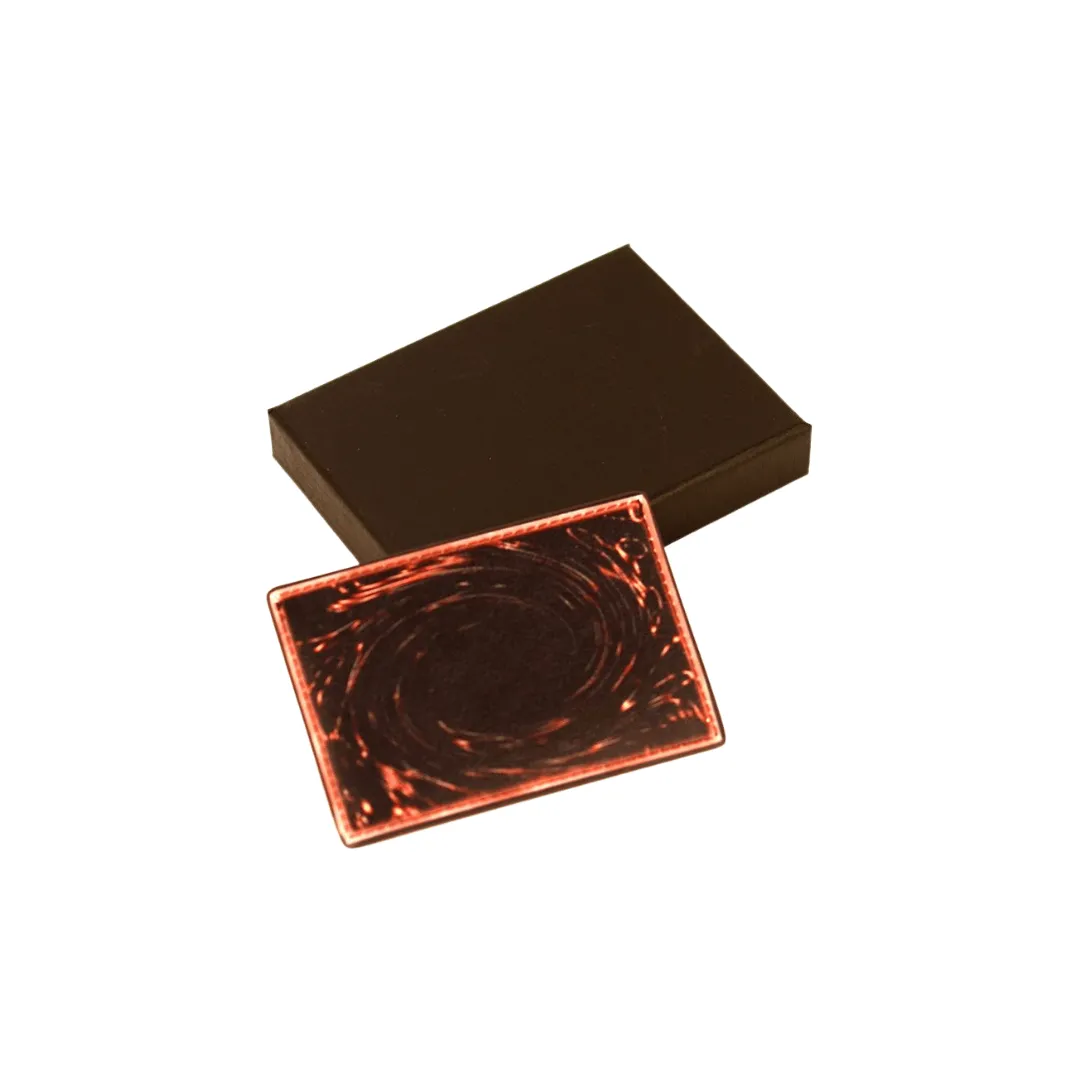 A brown leather cardholder with printed pattern to look like a yugioh card