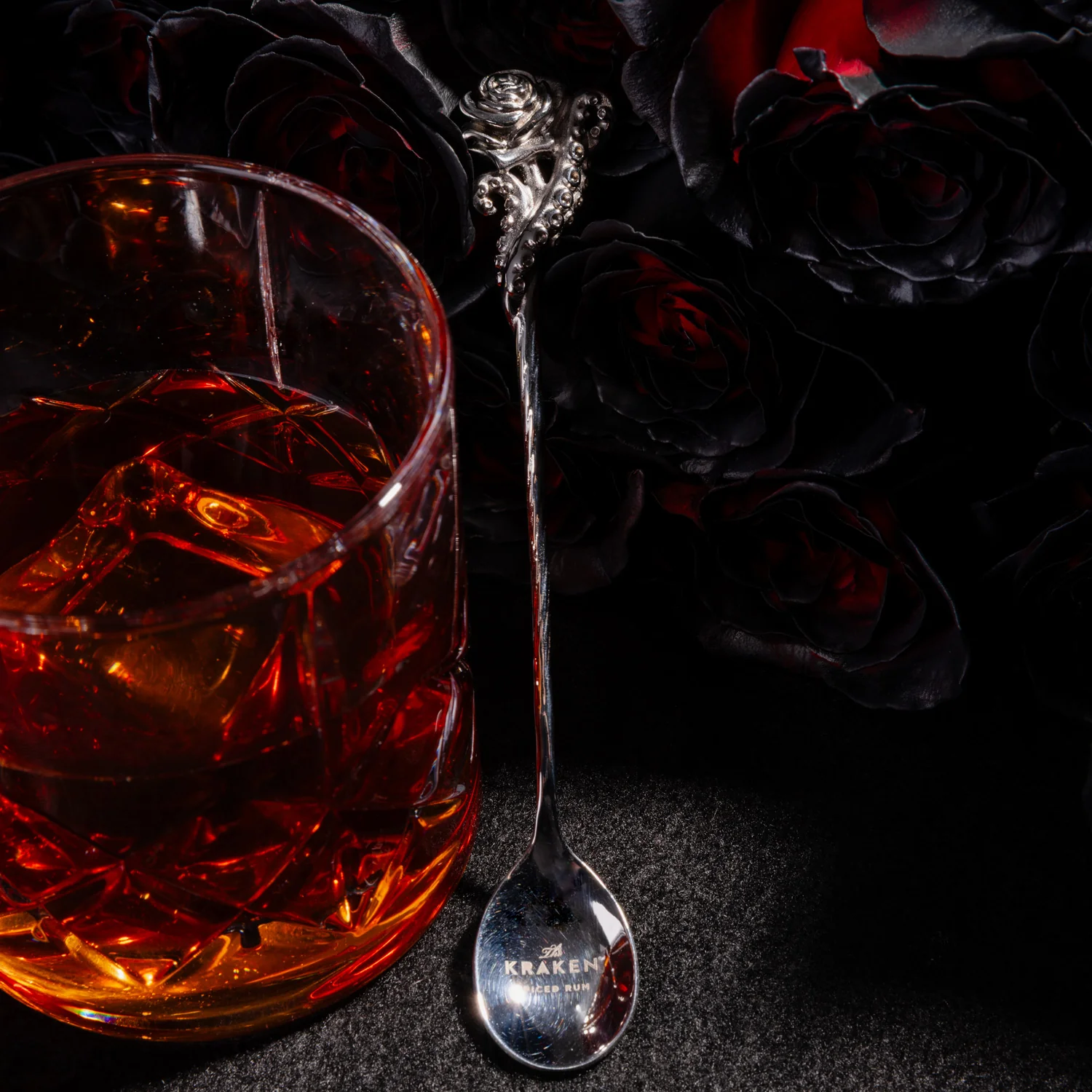 A custom gold plated necklace with half evils logo