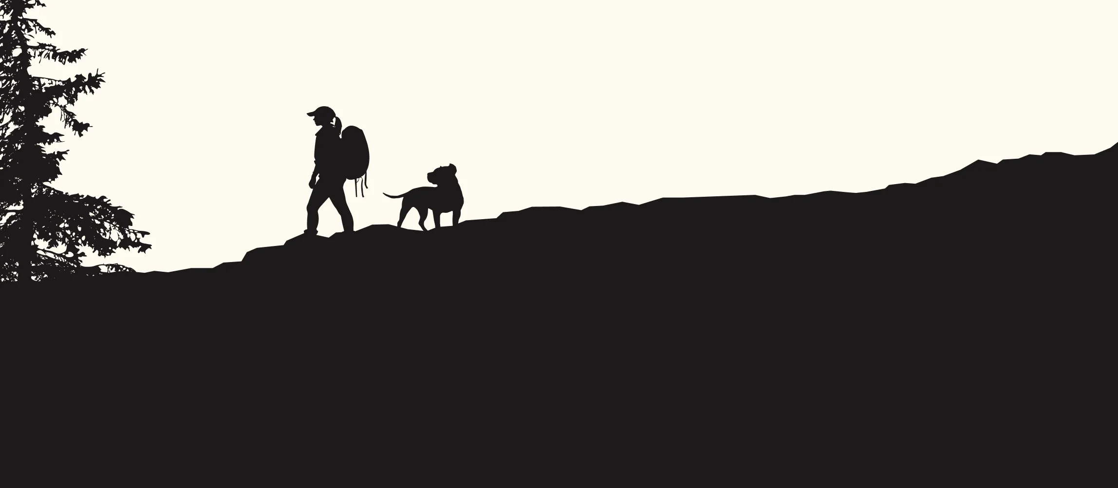 Silhouette of a hiker and dog on a hilltop beside pine trees