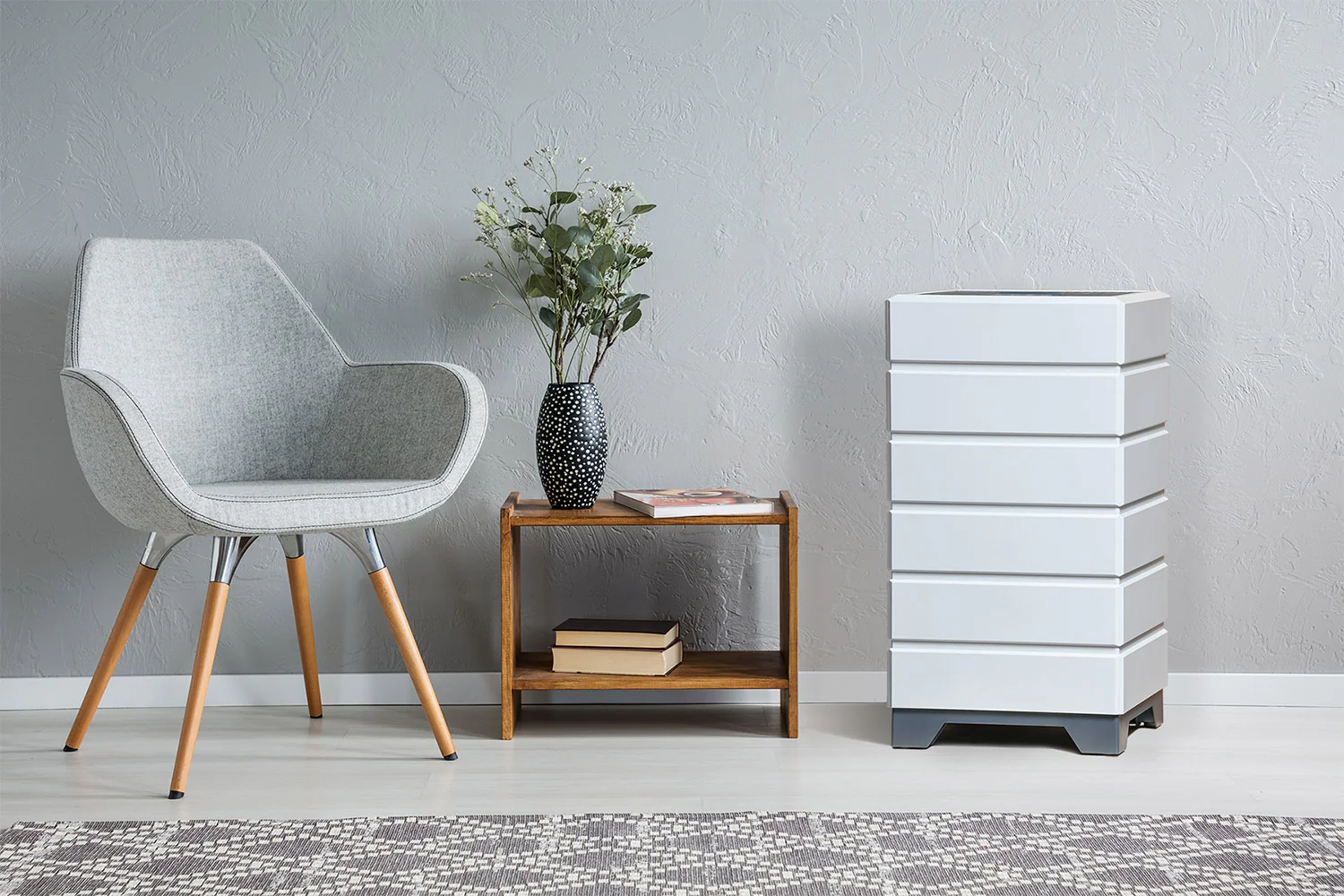 image of aspen air purifier in room with chair and decorated table