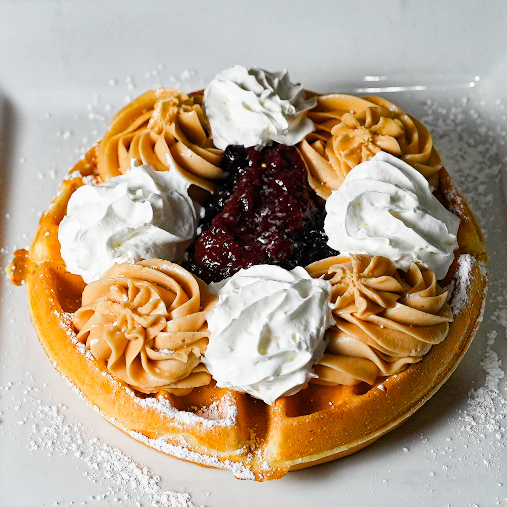 With house made maple syrup, powdered sugar & whipped butter