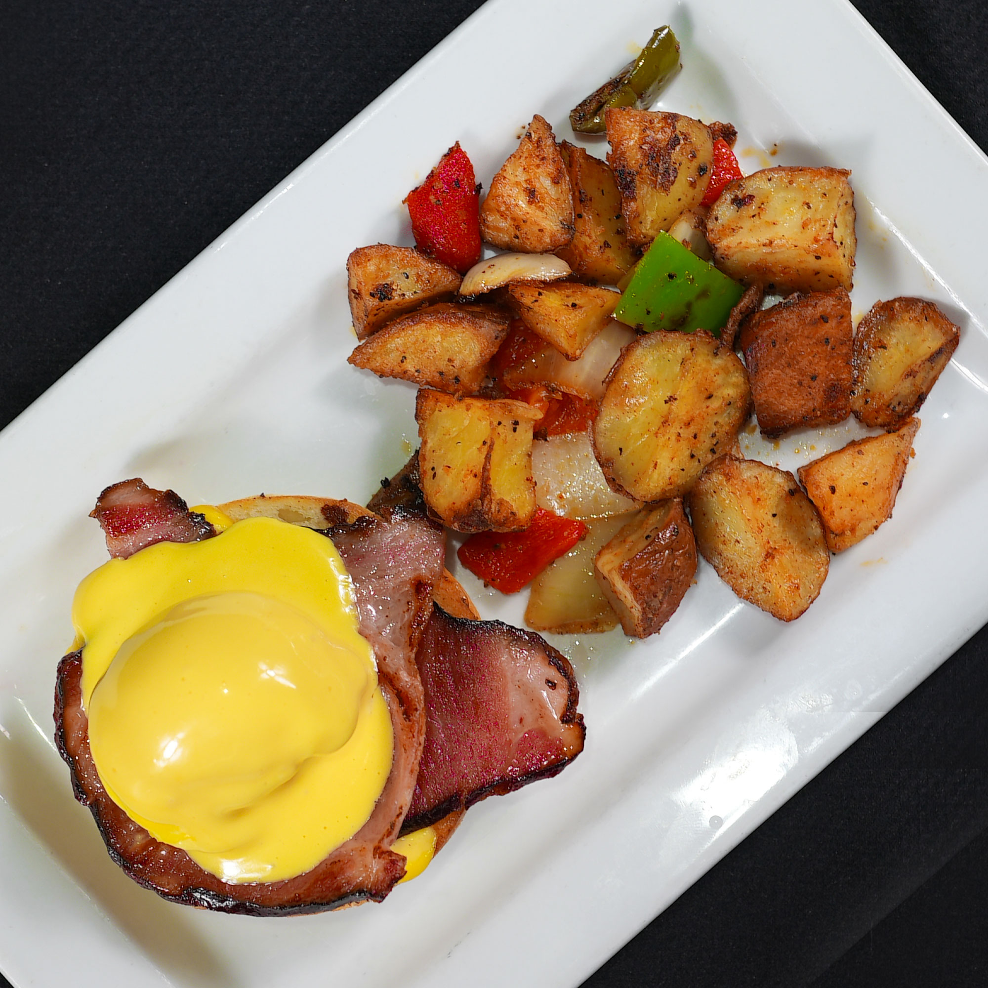 A half portion of our classic benedict. Served with house potatoes