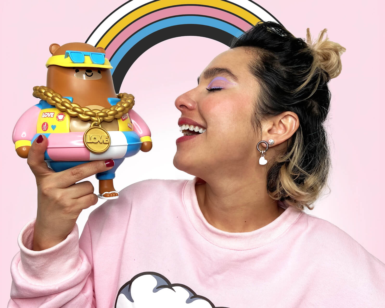 Chocotoy partner Karen Guevara holding Summy Bear toy.