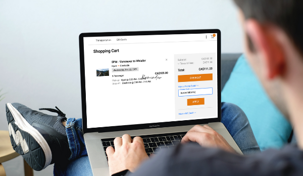 A traveller using a promo code on a reservation system