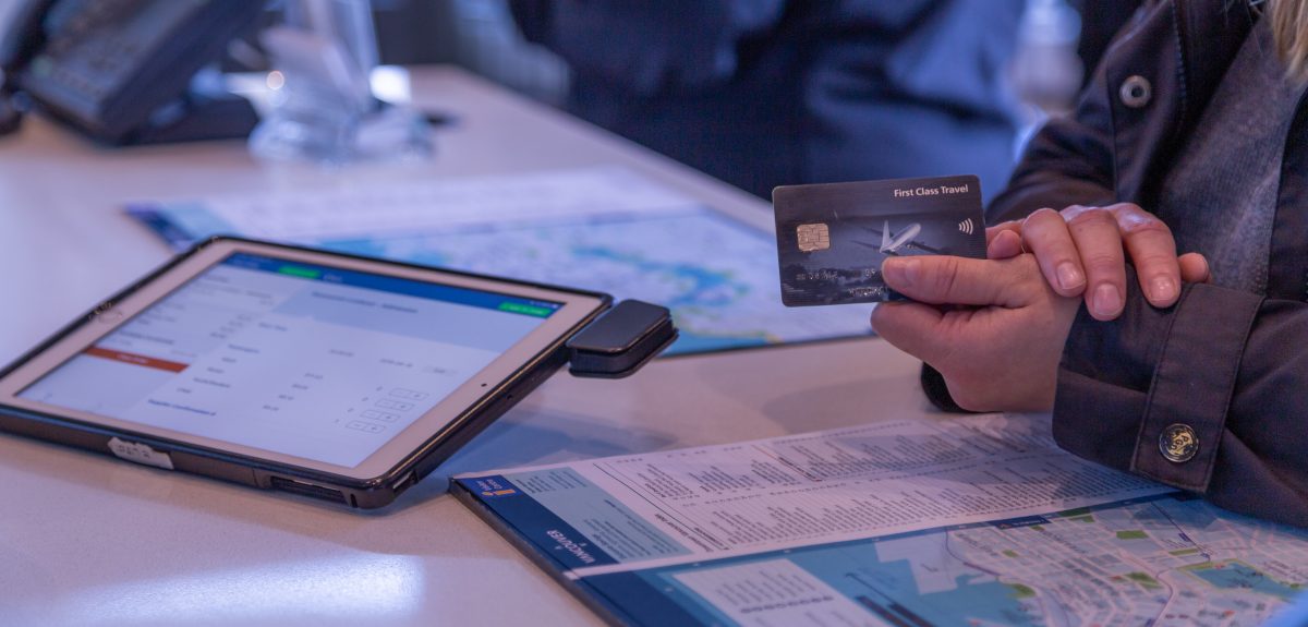 A tour operator using Zaui online booking system to electronically check in guests to promote sustainable tourism.