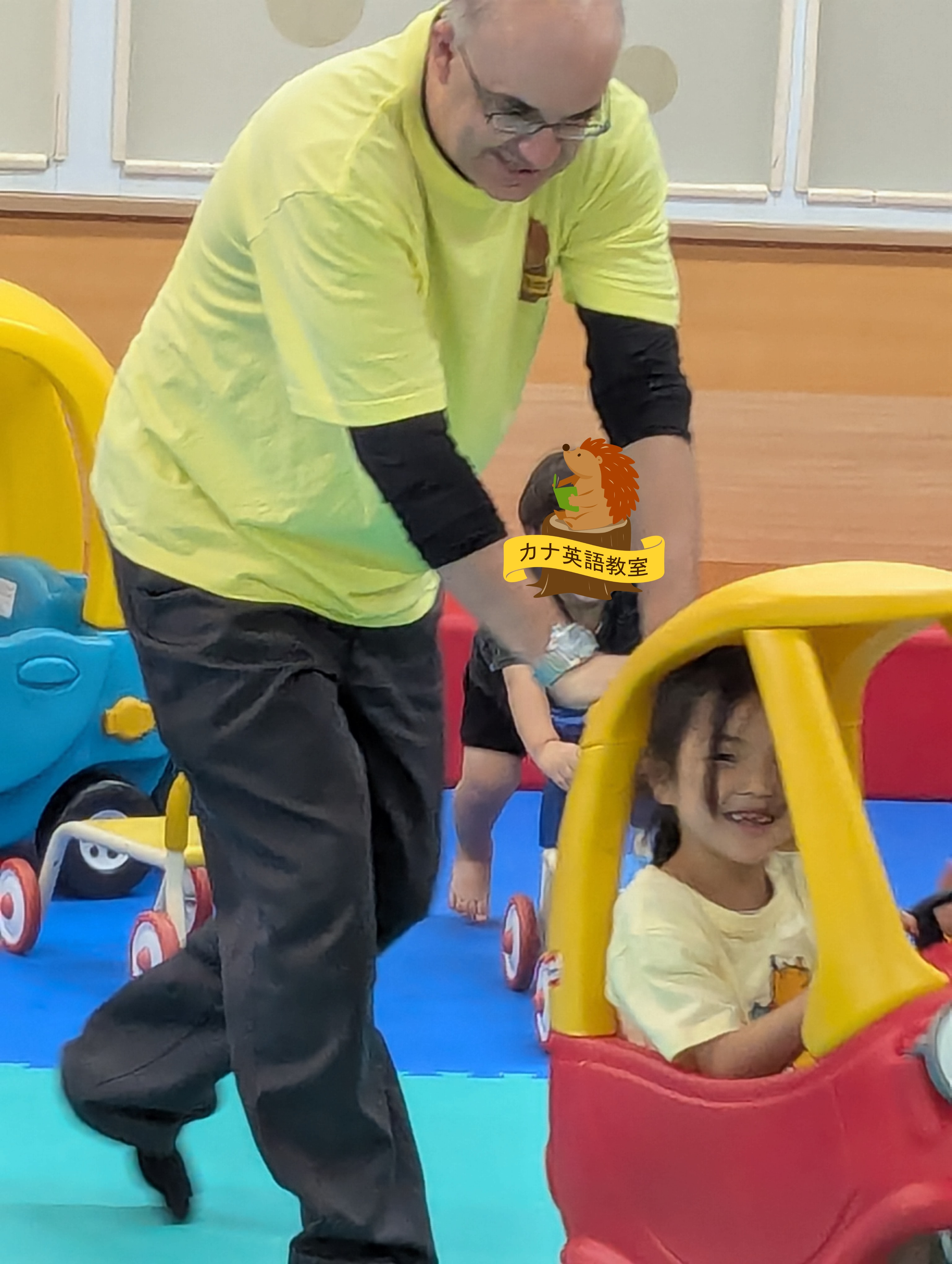 Our teacher playing with a student at an Event
