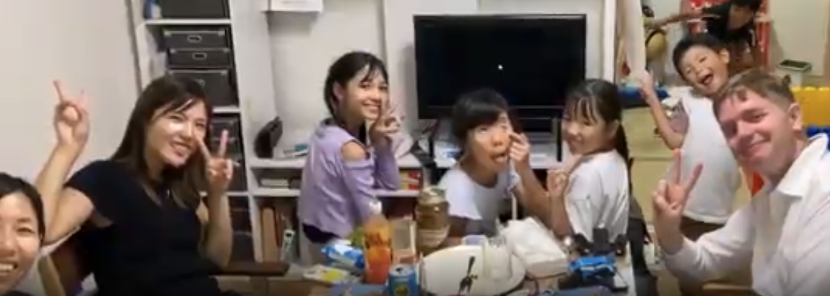 Adults and family enjoying at-home English