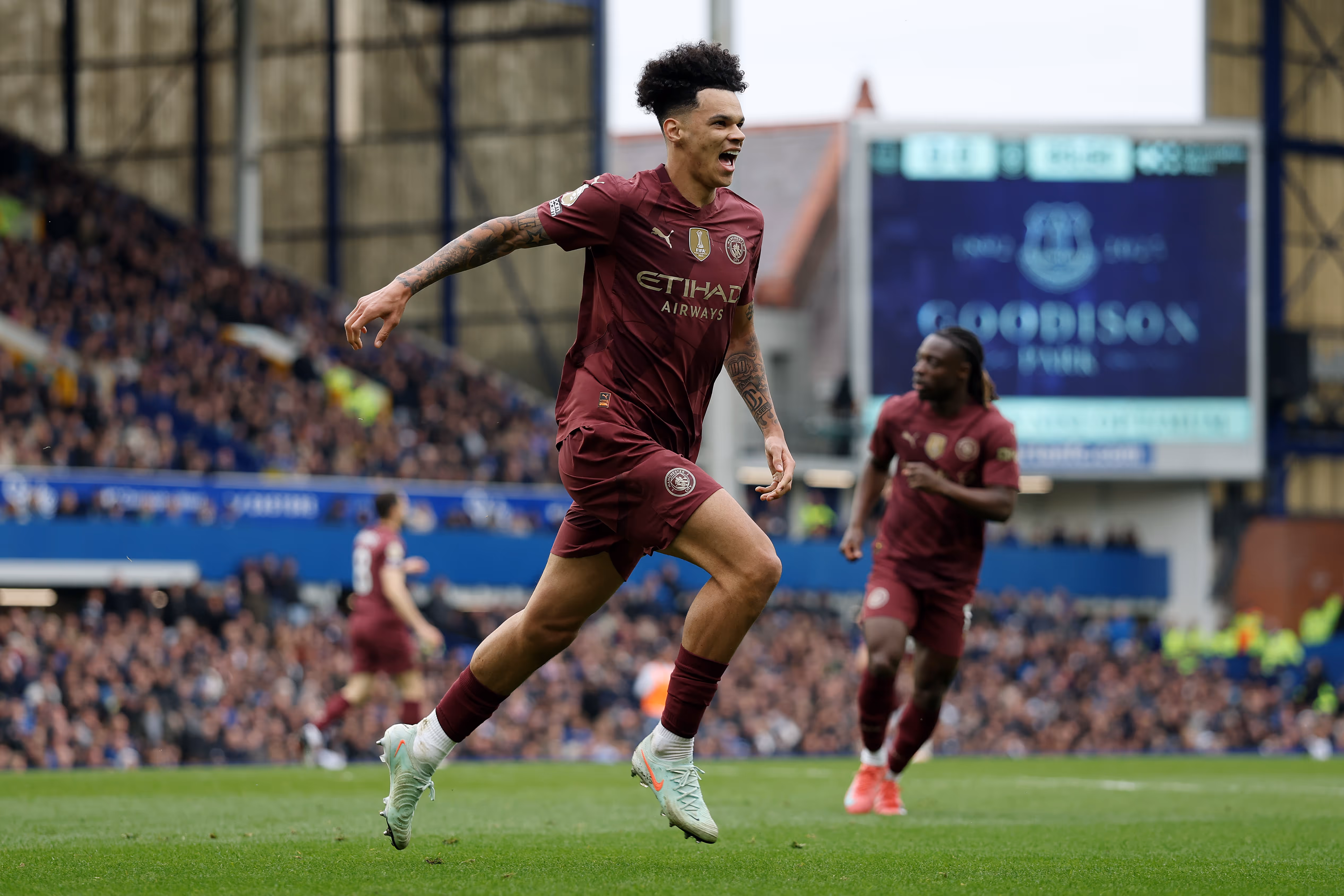 Manchester City Academy graduate Nico O'Reilly celebrates against Everton.