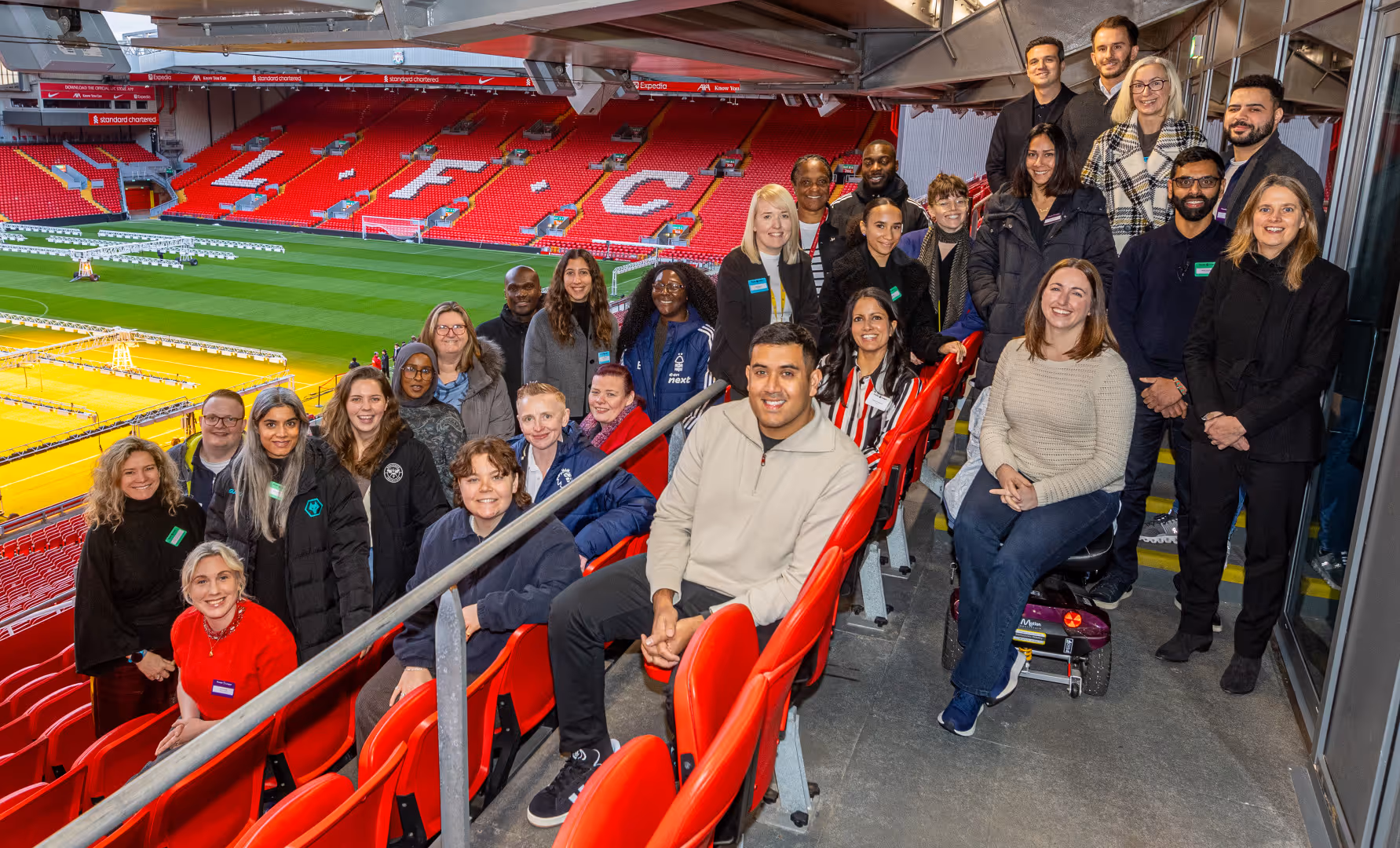 EDI Leads pose for a photo in the stands at Anfield, while attending the Premier League's PLEDIS Conference.