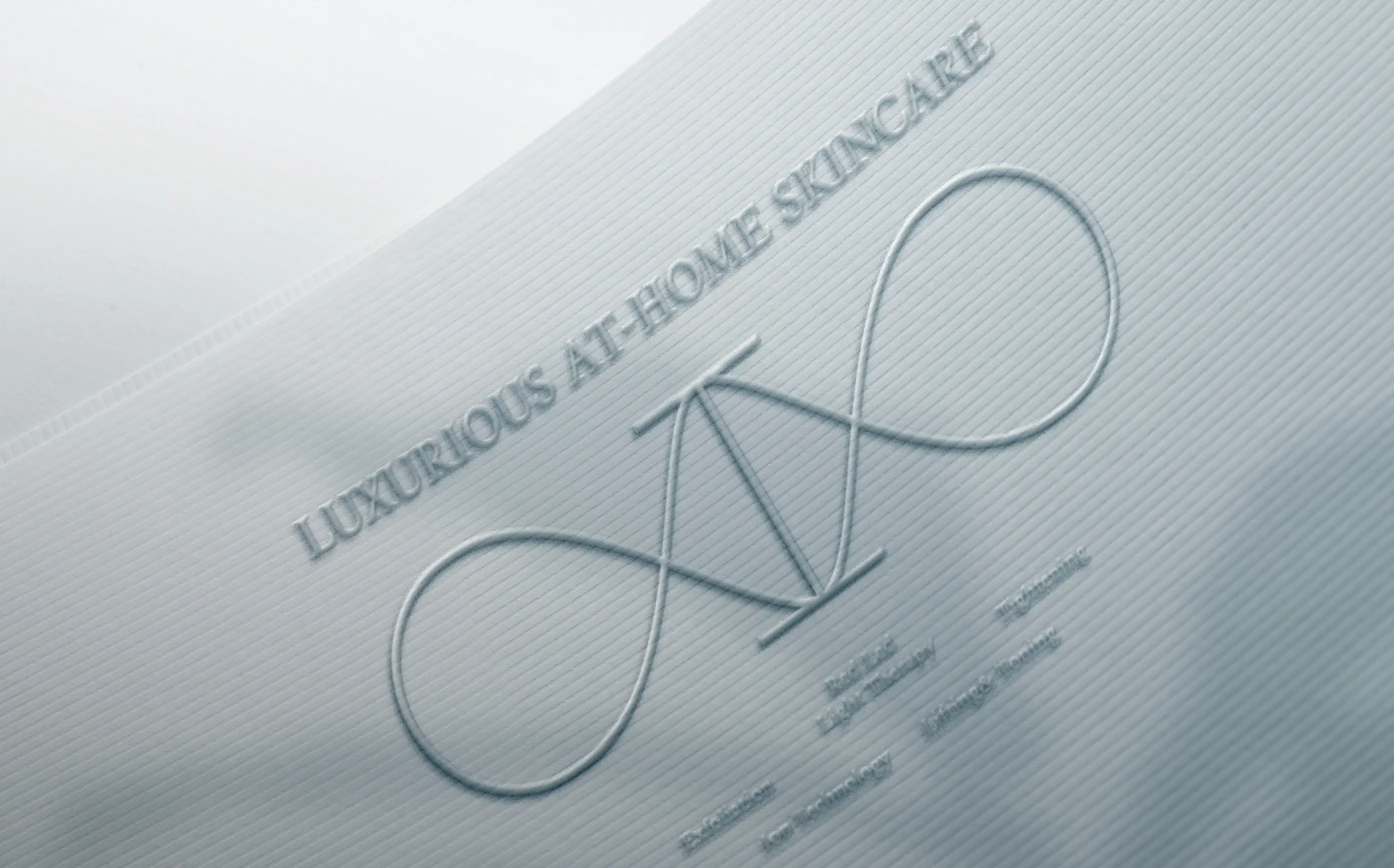 Aeterna infinity emboss — “luxurious at-home skincare” detail