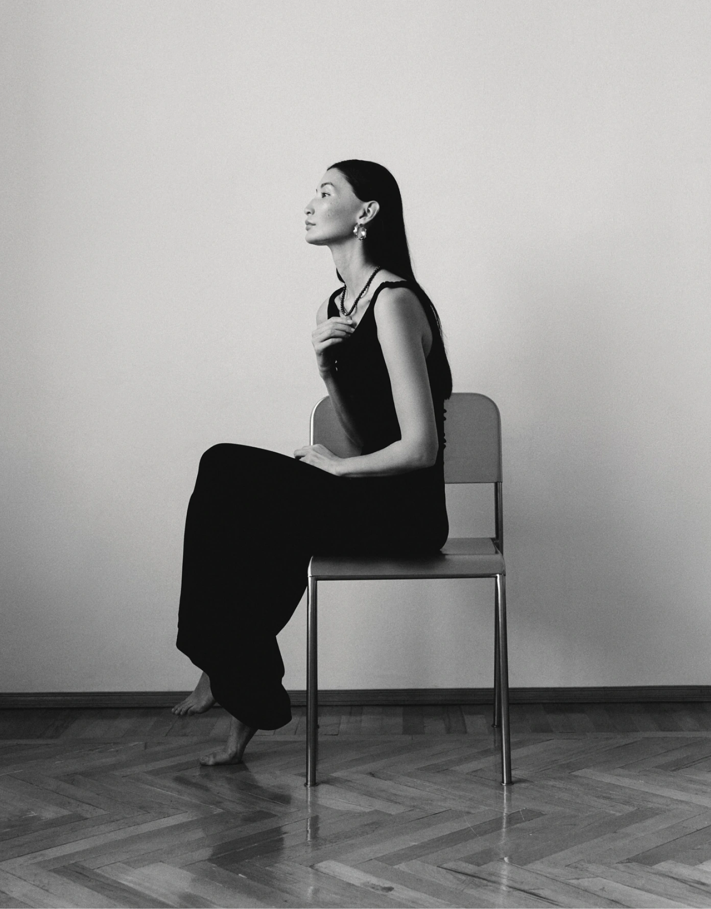 Editorial jewellery campaign — model seated in studio