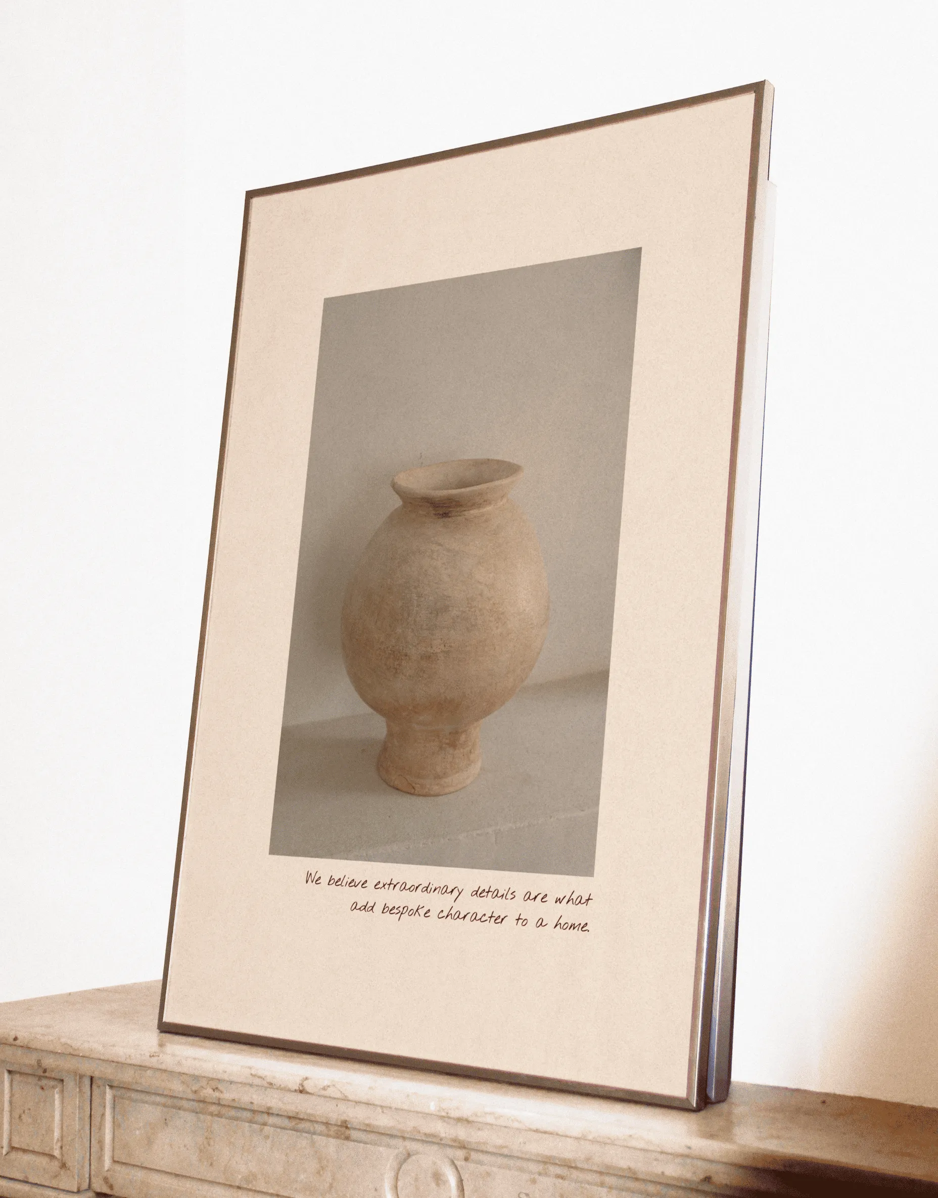 Framed photo of a clay vase with a caption underneath.