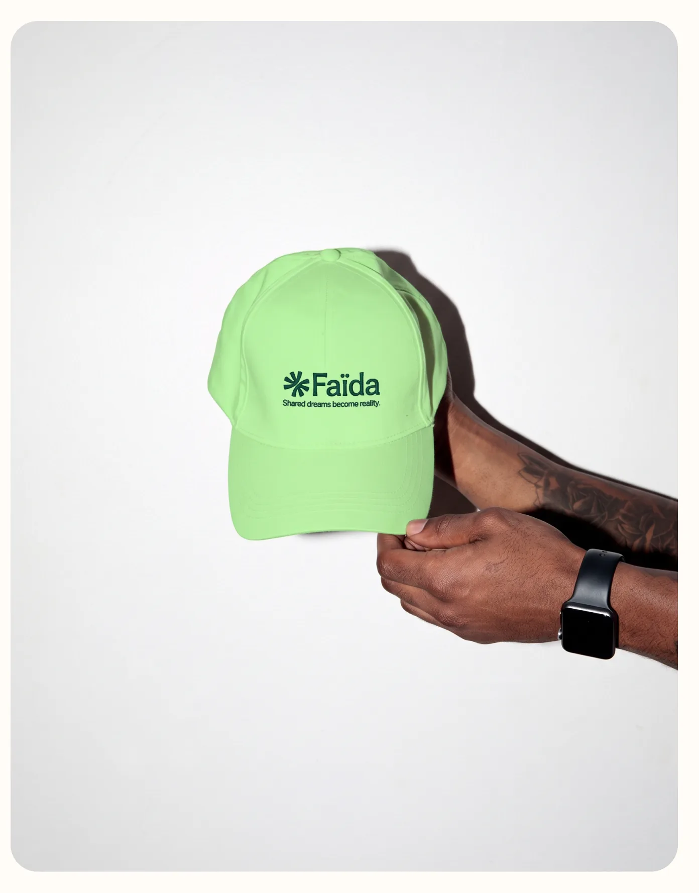 Light green cap with the Faïda logo