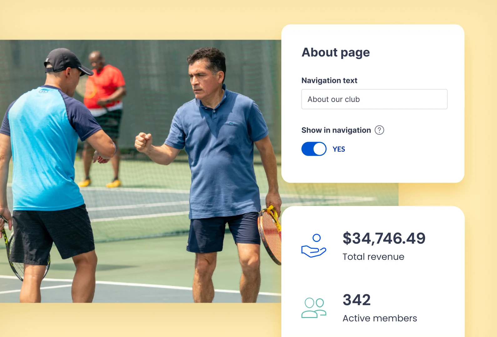 Two men on a tennis court fist bumping, one holding a tennis racket, with a third person blurred in the background.