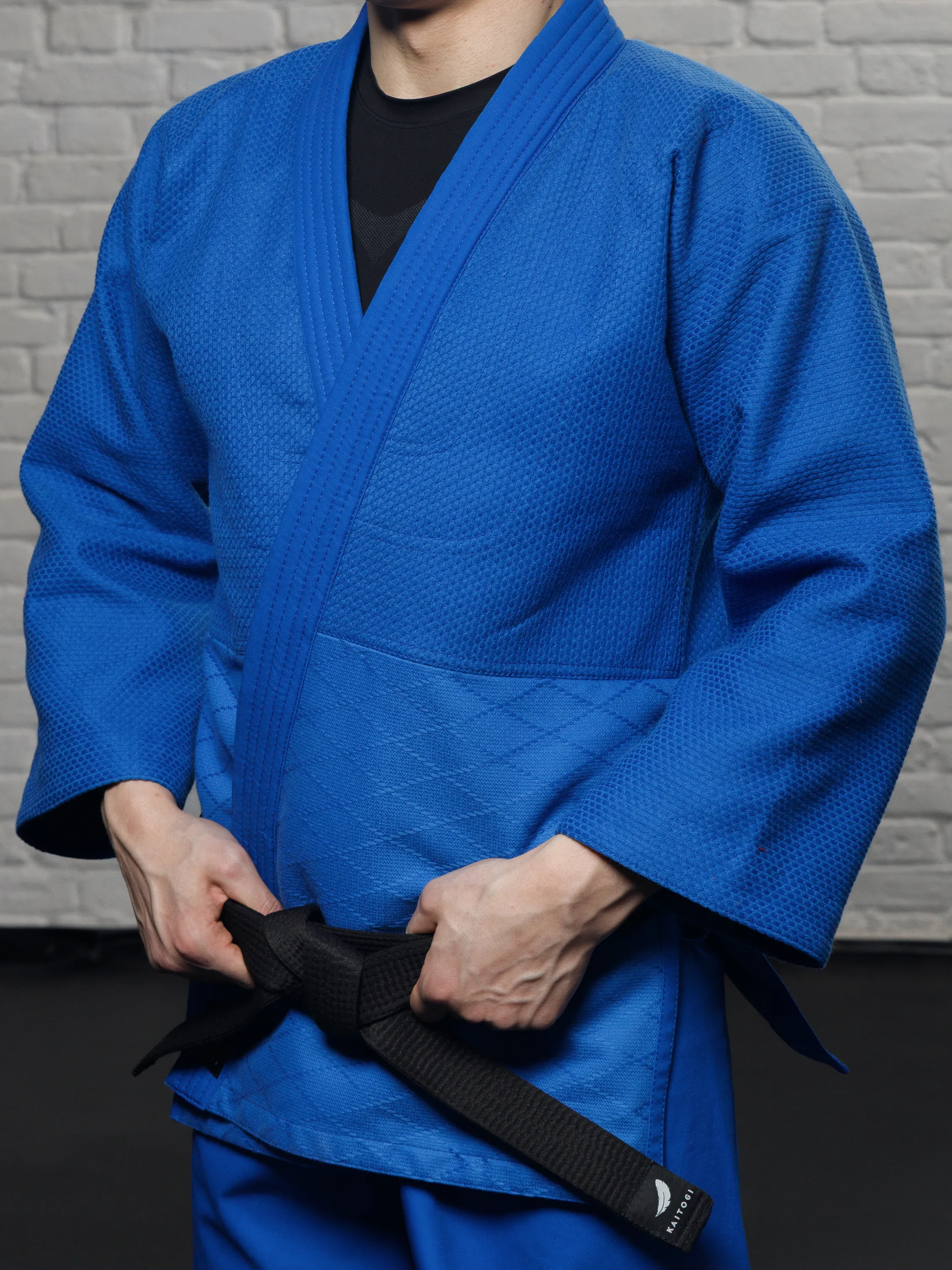 Ткань кимоно для дзюдо крупным планом, плотное плетение 650 гр