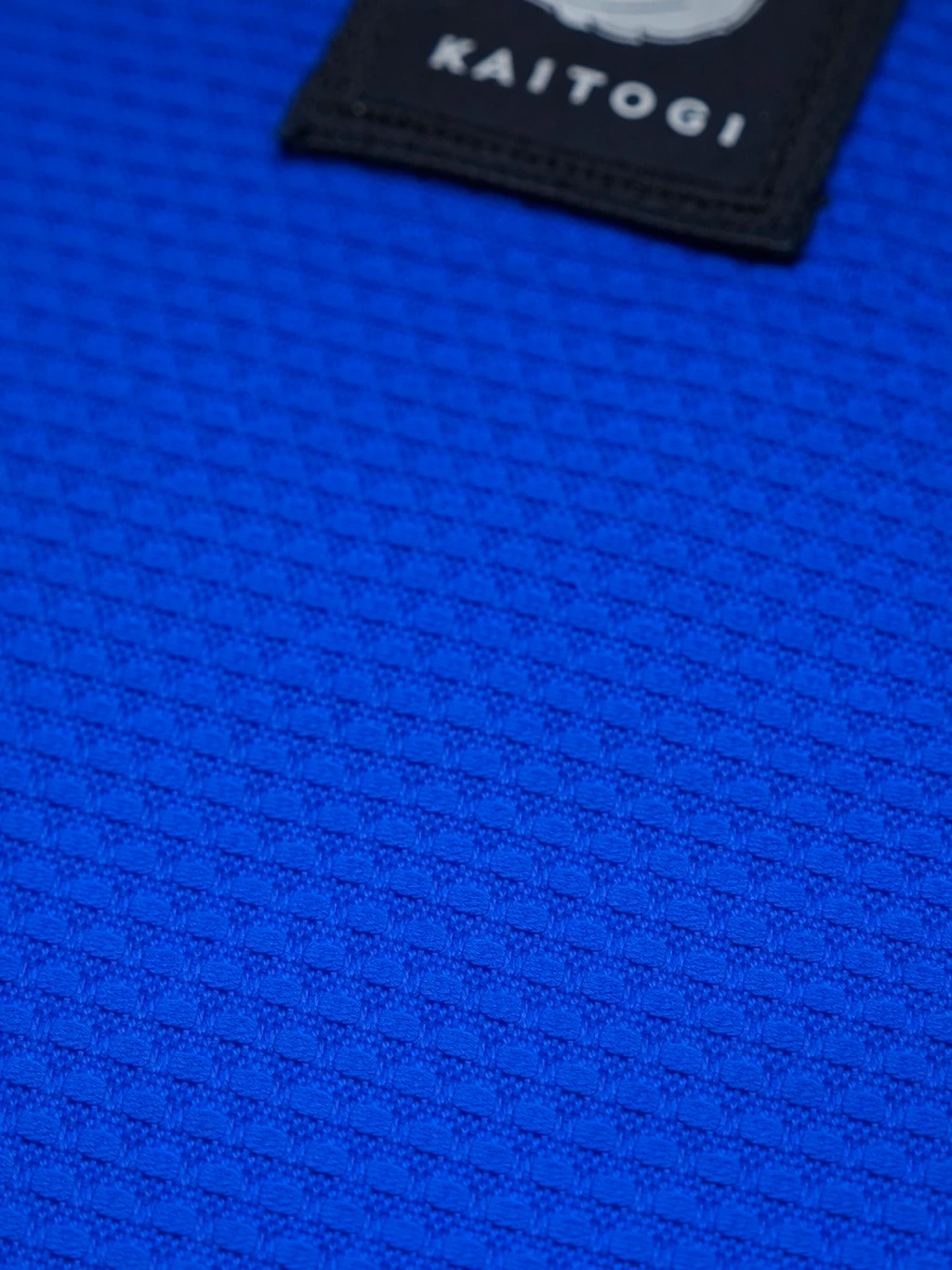 Текстура синего плетеного полотна, обеспечивающая отличный коэффициент трения при захвате