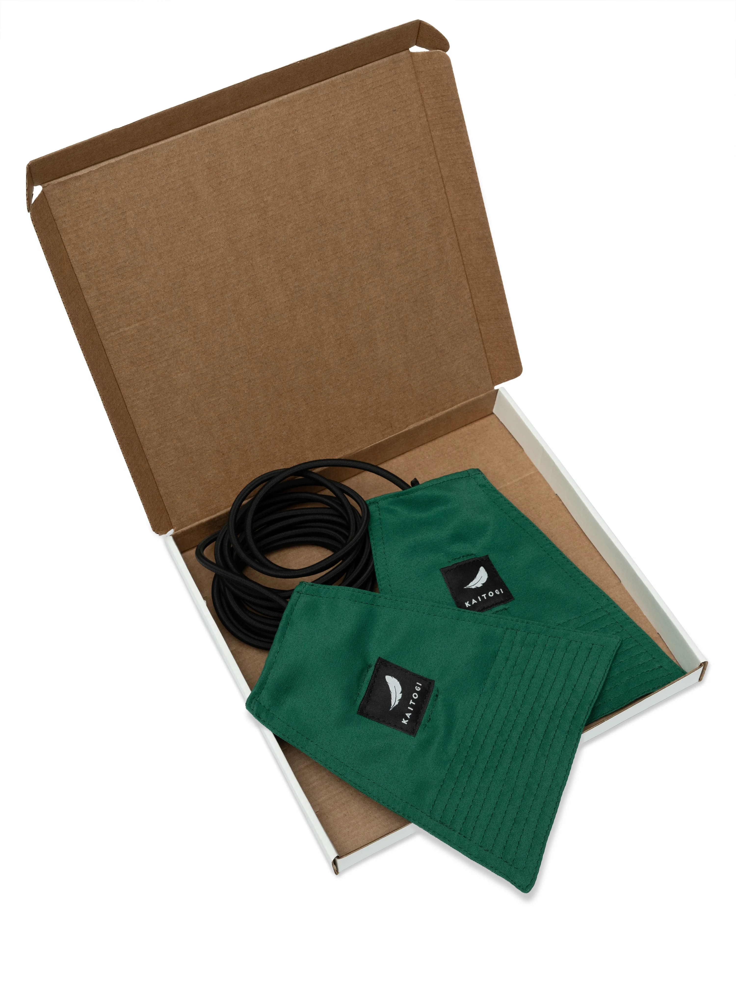 Зеленая модель детского тренажера Учикоми в фирменной коробке KAITOGI — готовое решение для подарка спортсмену