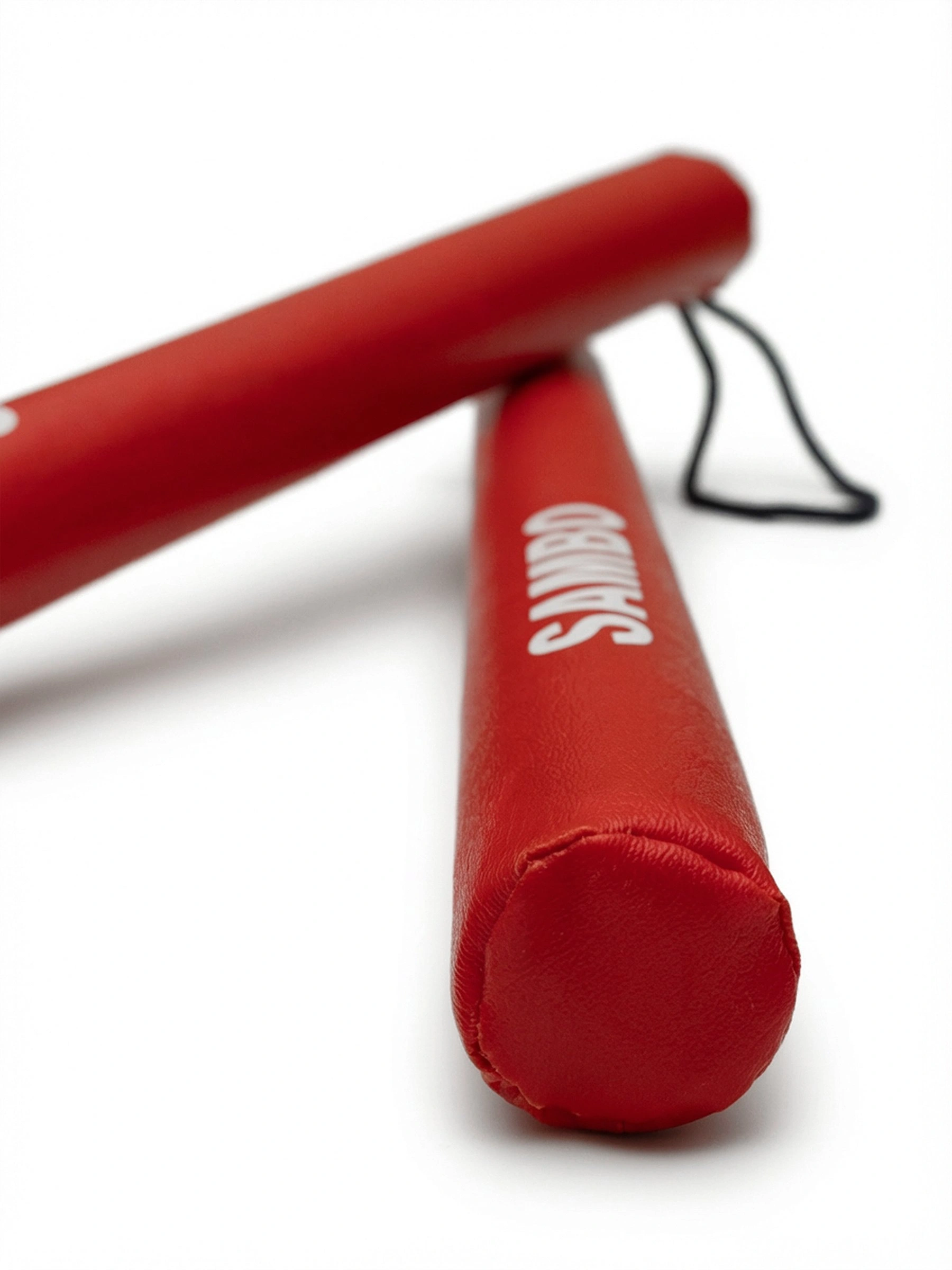 Палочки красные для самбо (ударная техника), вид сбоку: изоляционный слой 1 см эффективно гасит энергию удара