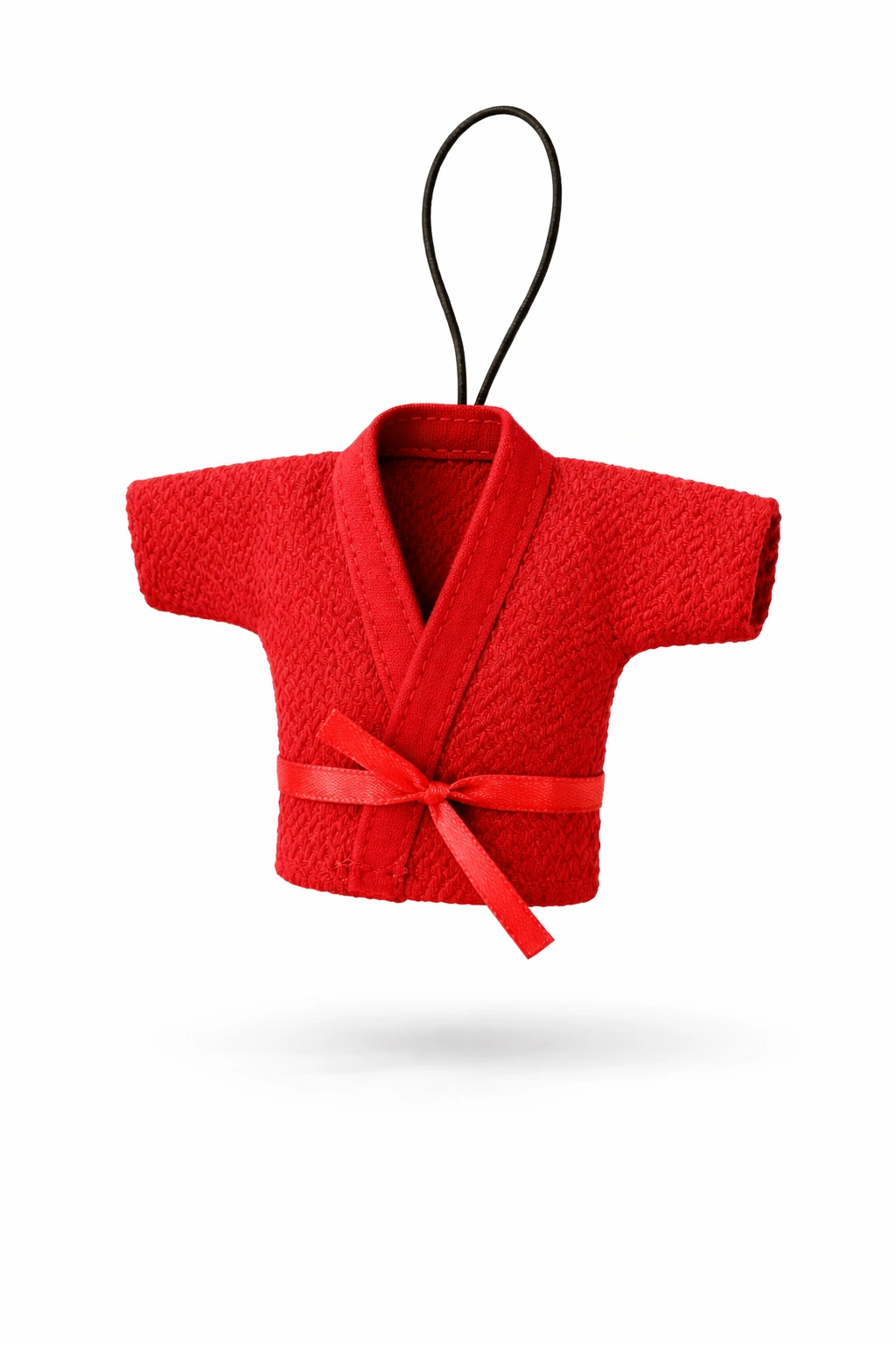 Фронтальный вид красной миниатюрной курточки самбо National Team: видна фактурная плетёная ткань, аккуратный ворот и подвесная петля для крепления в автомобиле