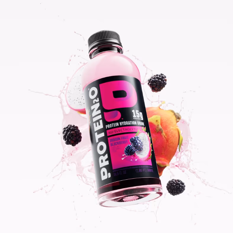 Bottle of Protein2o protein hydration drink with dragon fruit and blackberries around it and splash effect.
