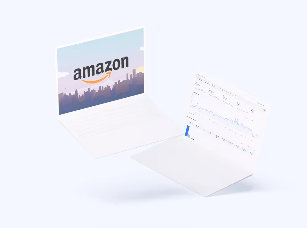 Two minimalist white laptops floating, one showing Amazon logo with a city skyline background, the other displaying analytics graphs.