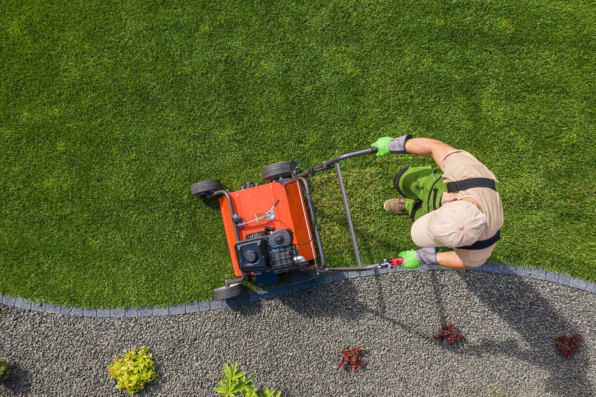 Highland Lawn & Landscaping crew member performing lawn aeration near me