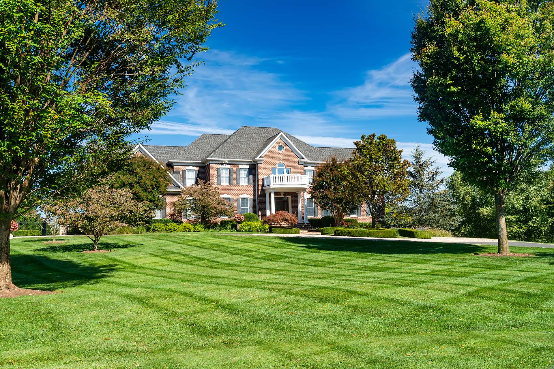Crisp mowing lines on commercial lawn in Brazoria County