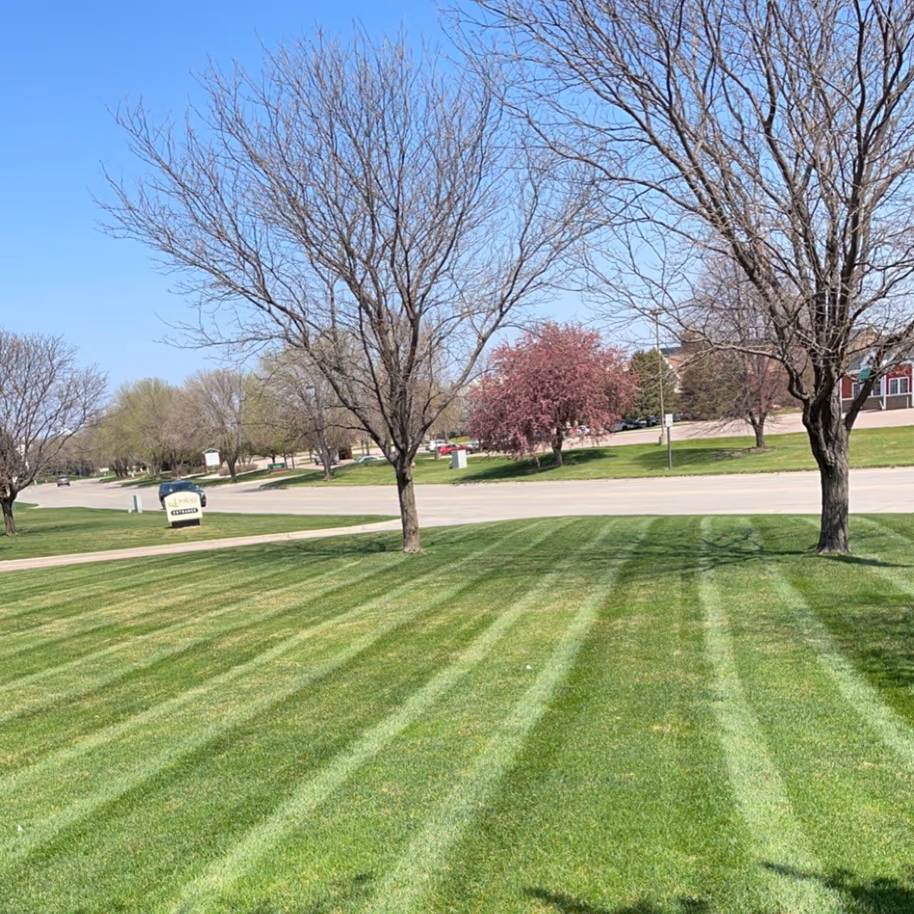 Highland Lawn & Landscaping performing lawn maintenance service near me