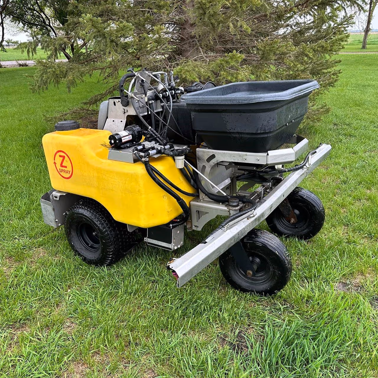 Applying lawn fertilizer for lush, green turf in Brazoria and Fort Bend