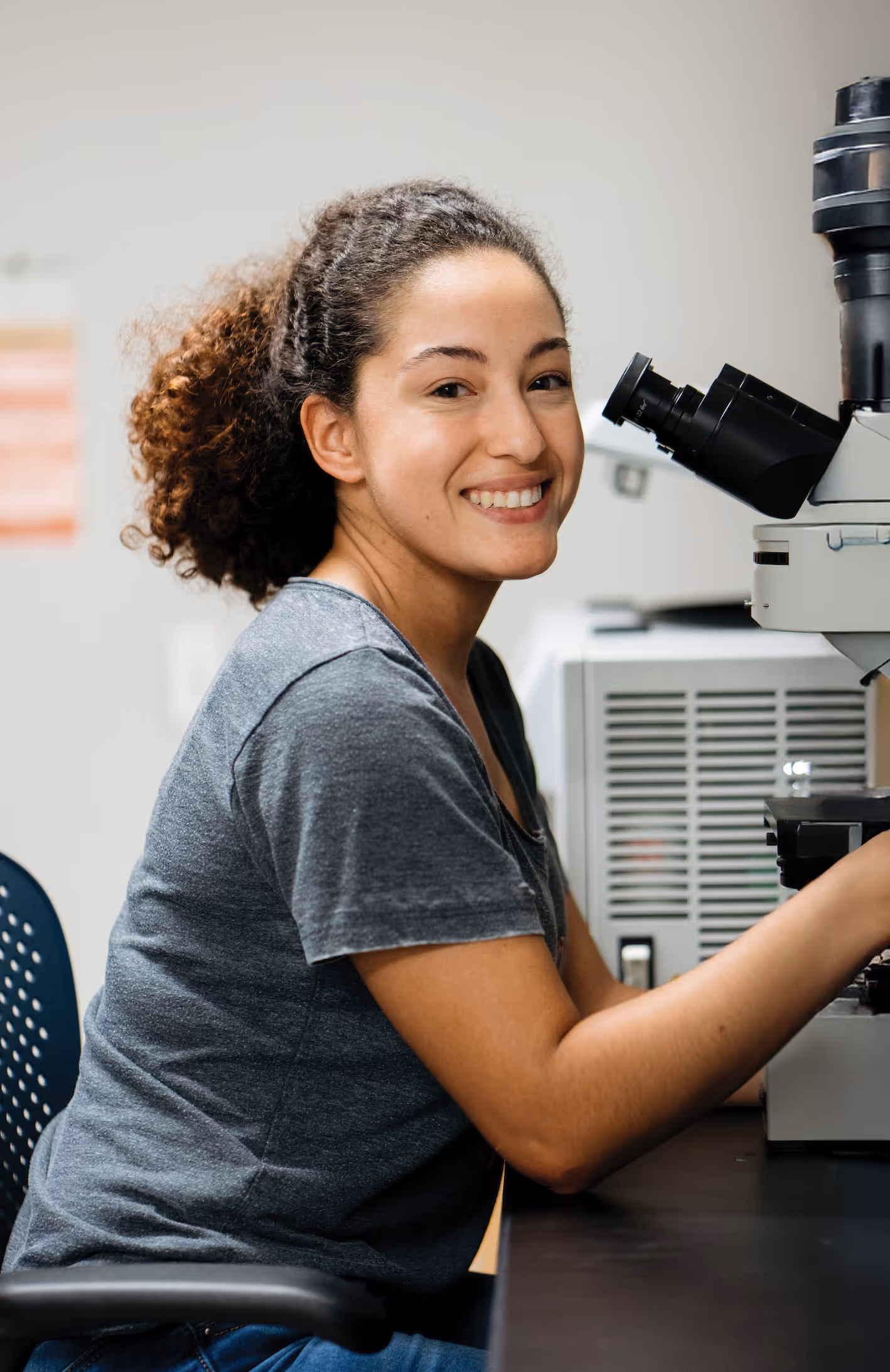 Female STEM student in a science lab