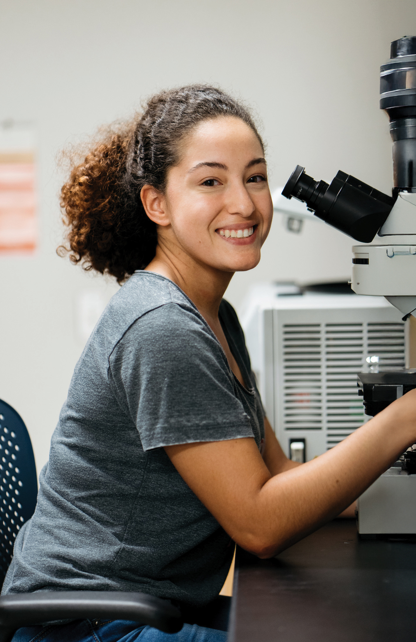 Female STEM student in a science lab