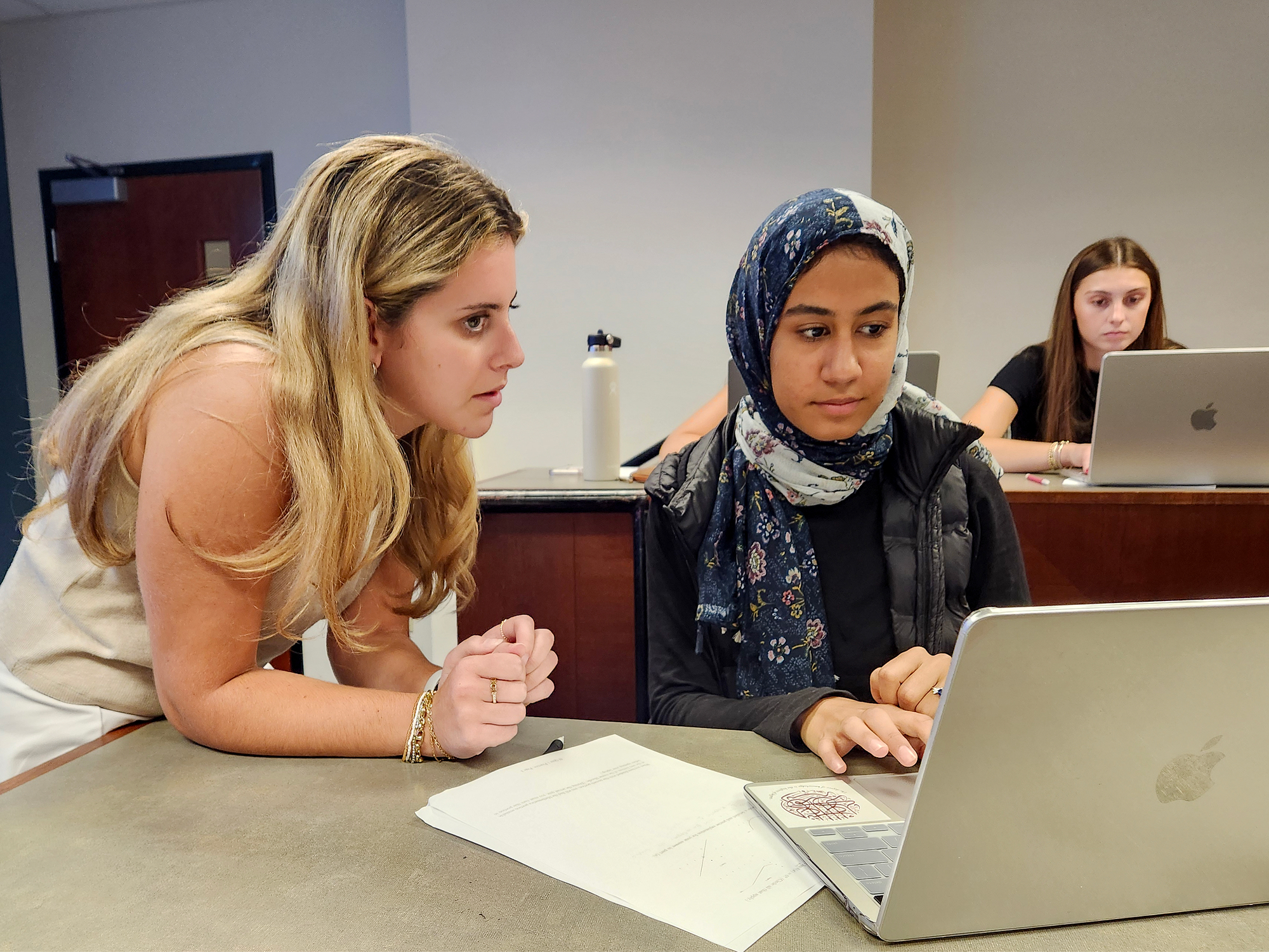 Faculty and students working together