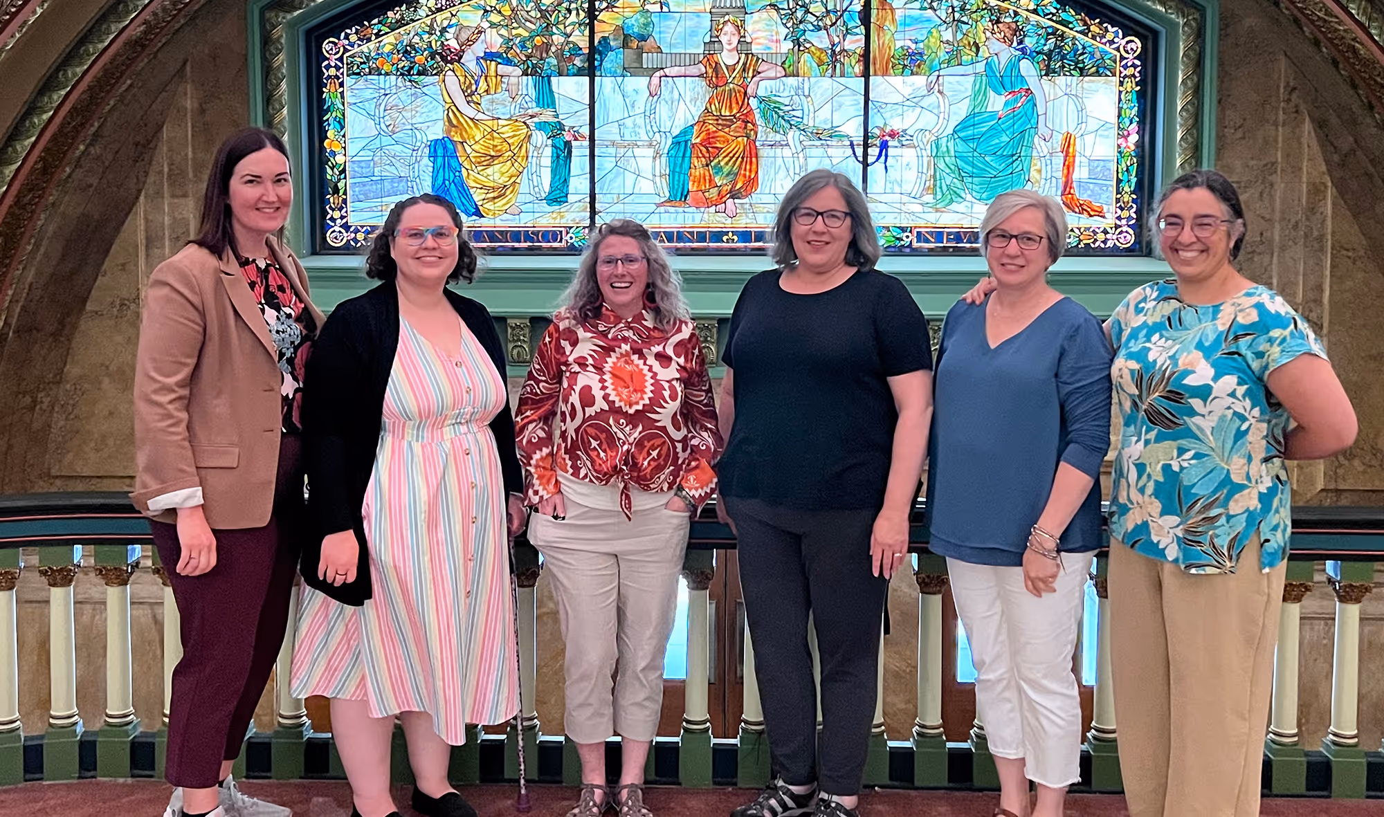 Group of staff members at an in-person meeting