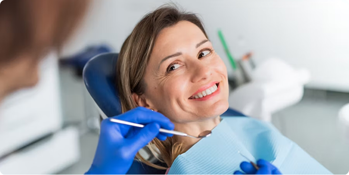 Patient smiling at dentist office