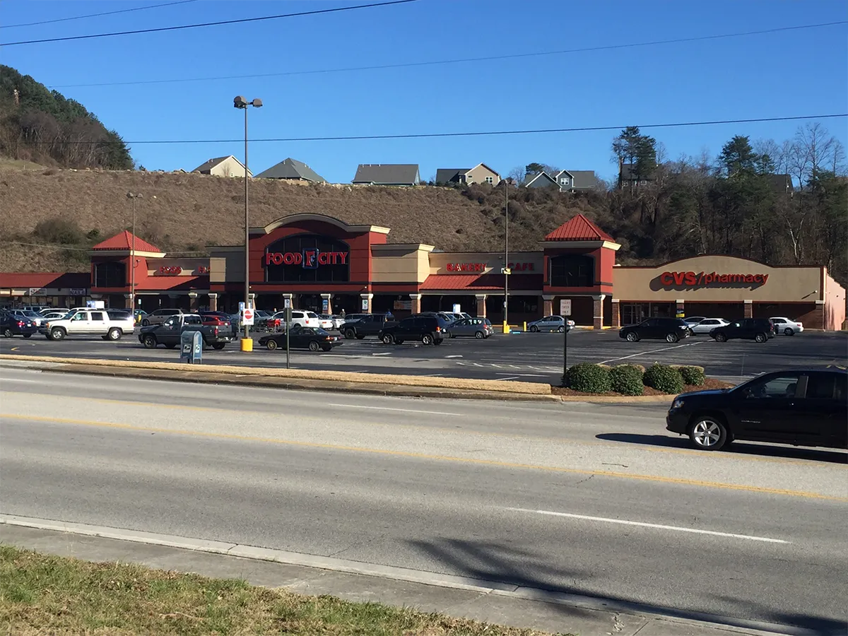 Street-level view of Food City grocery store and retail development in Chattanooga, TN, built by Bock Construction.