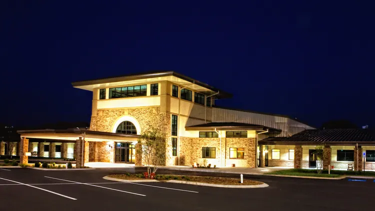 Exterior of Clear Creek Church of Christ in Hixson, TN, at night constructed by Bock Construction.